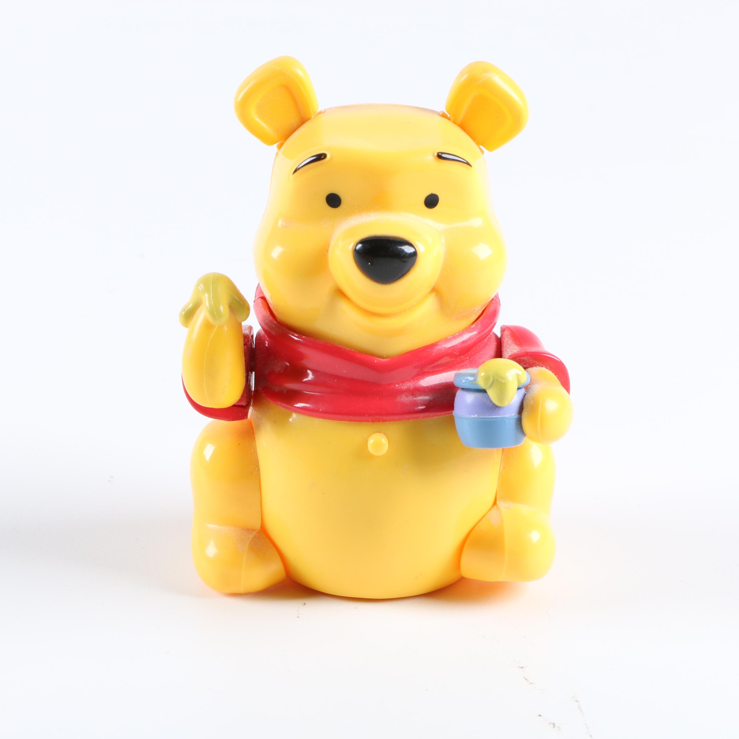 Collection of Winnie the Pooh Figurines