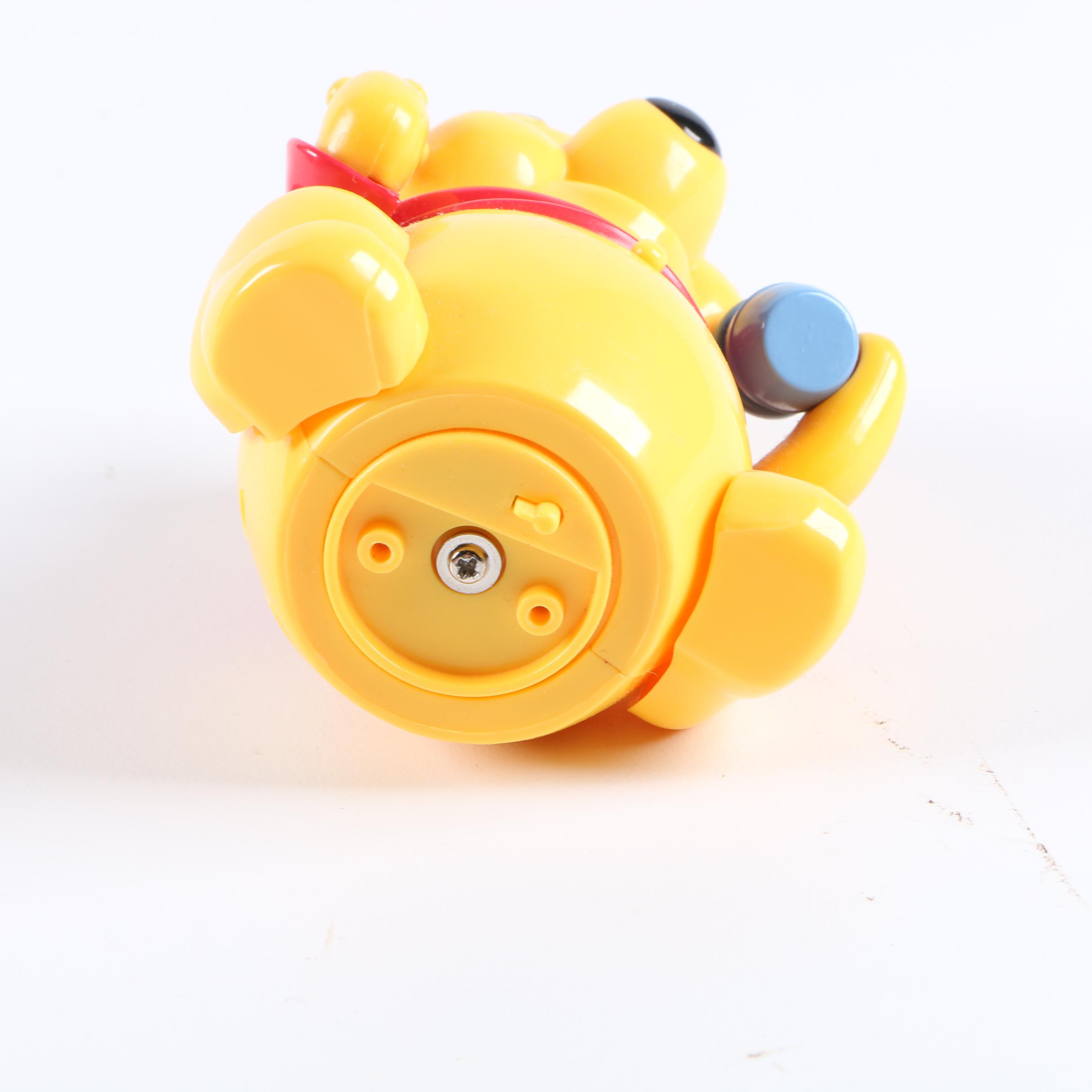 Collection of Winnie the Pooh Figurines