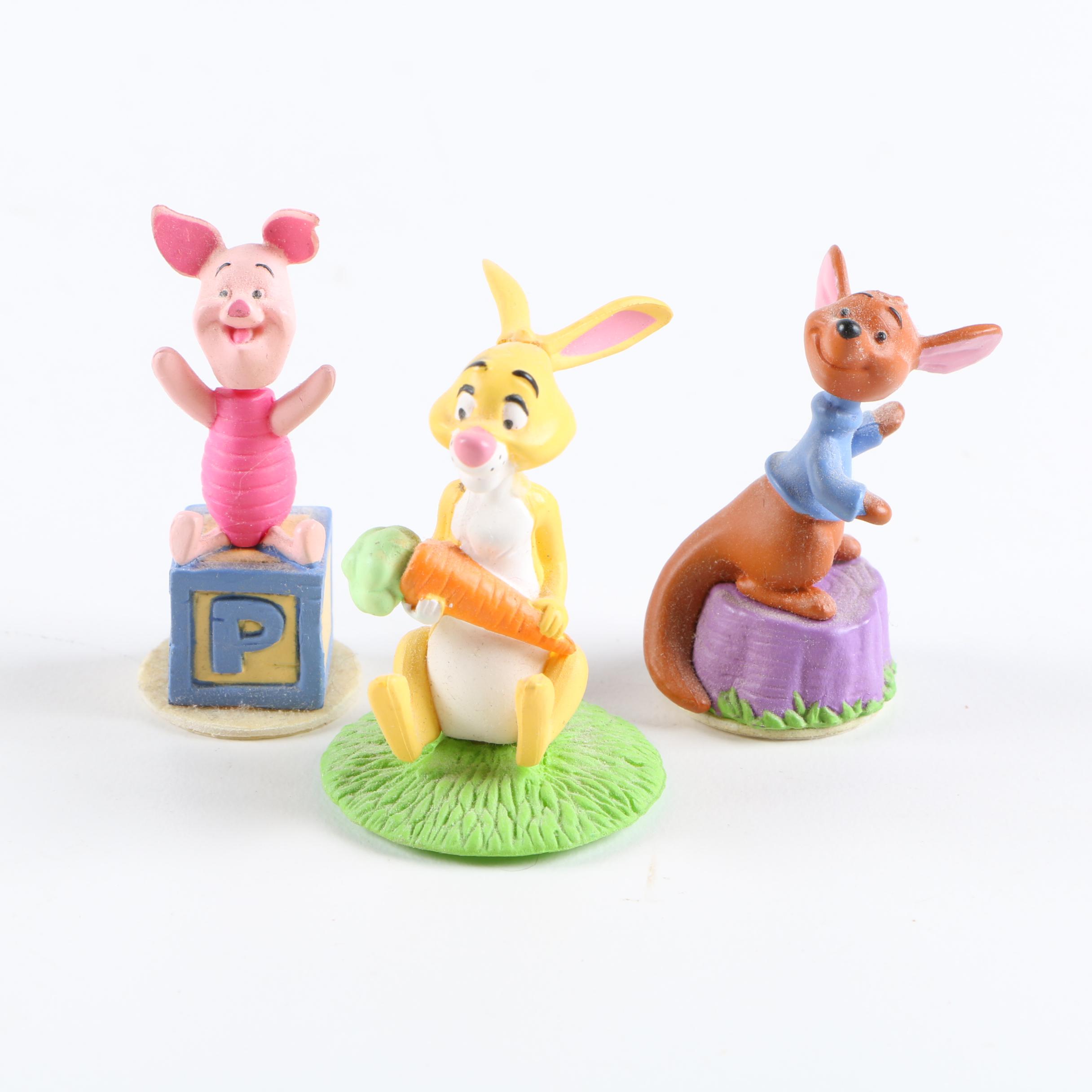 Collection of Winnie the Pooh Figurines