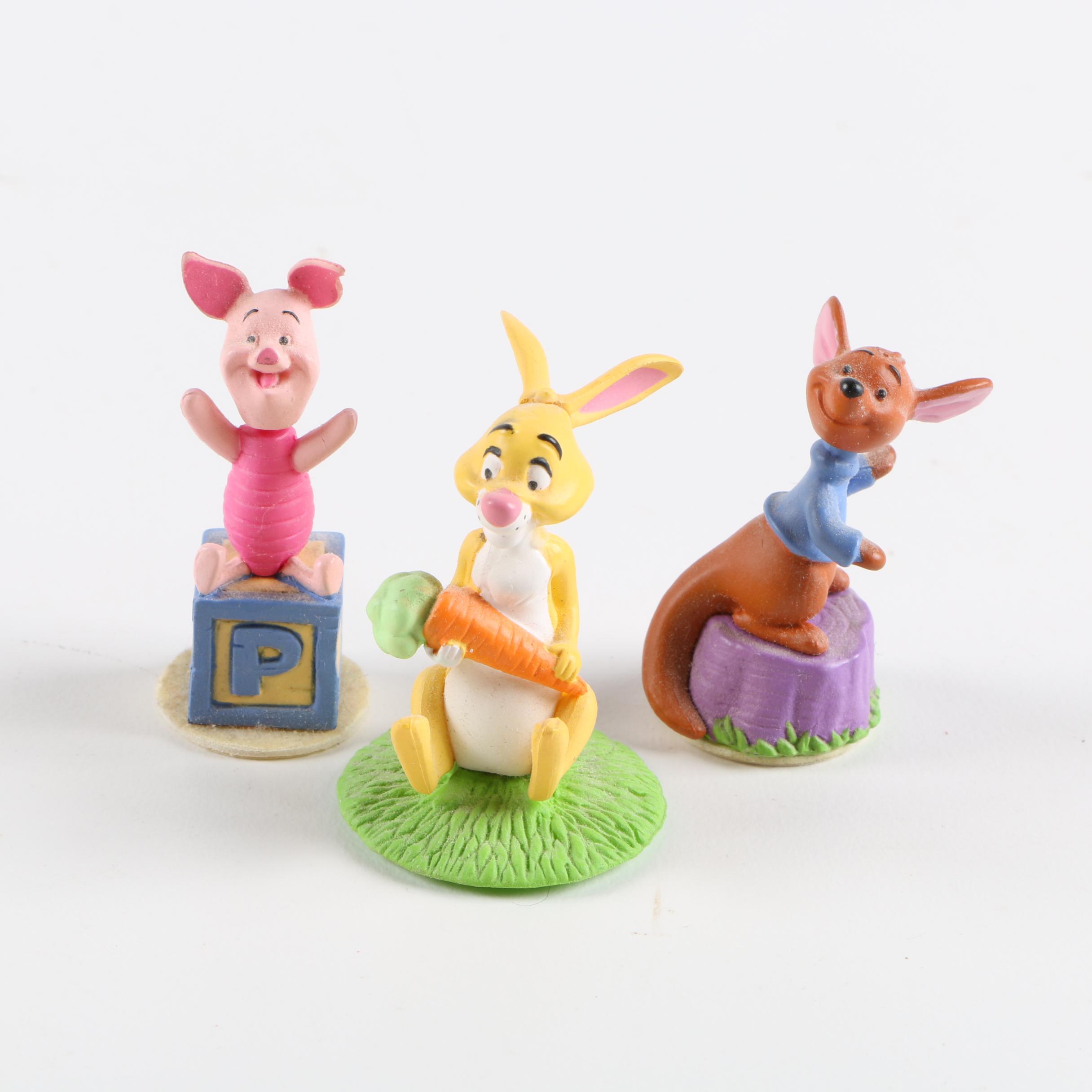 Collection of Winnie the Pooh Figurines