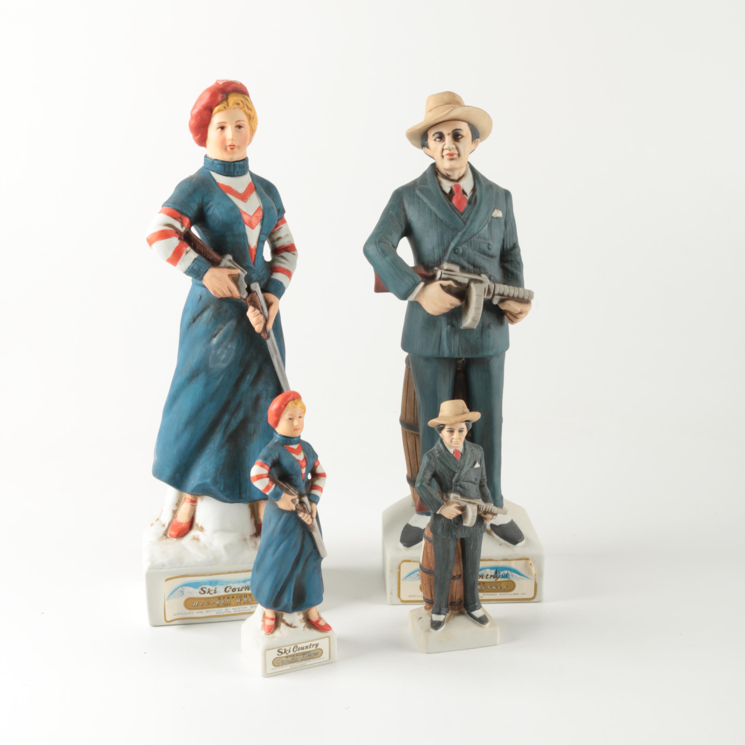 Ski-Country Bonnie and Clyde Series Bourbon Bottles an Figurines