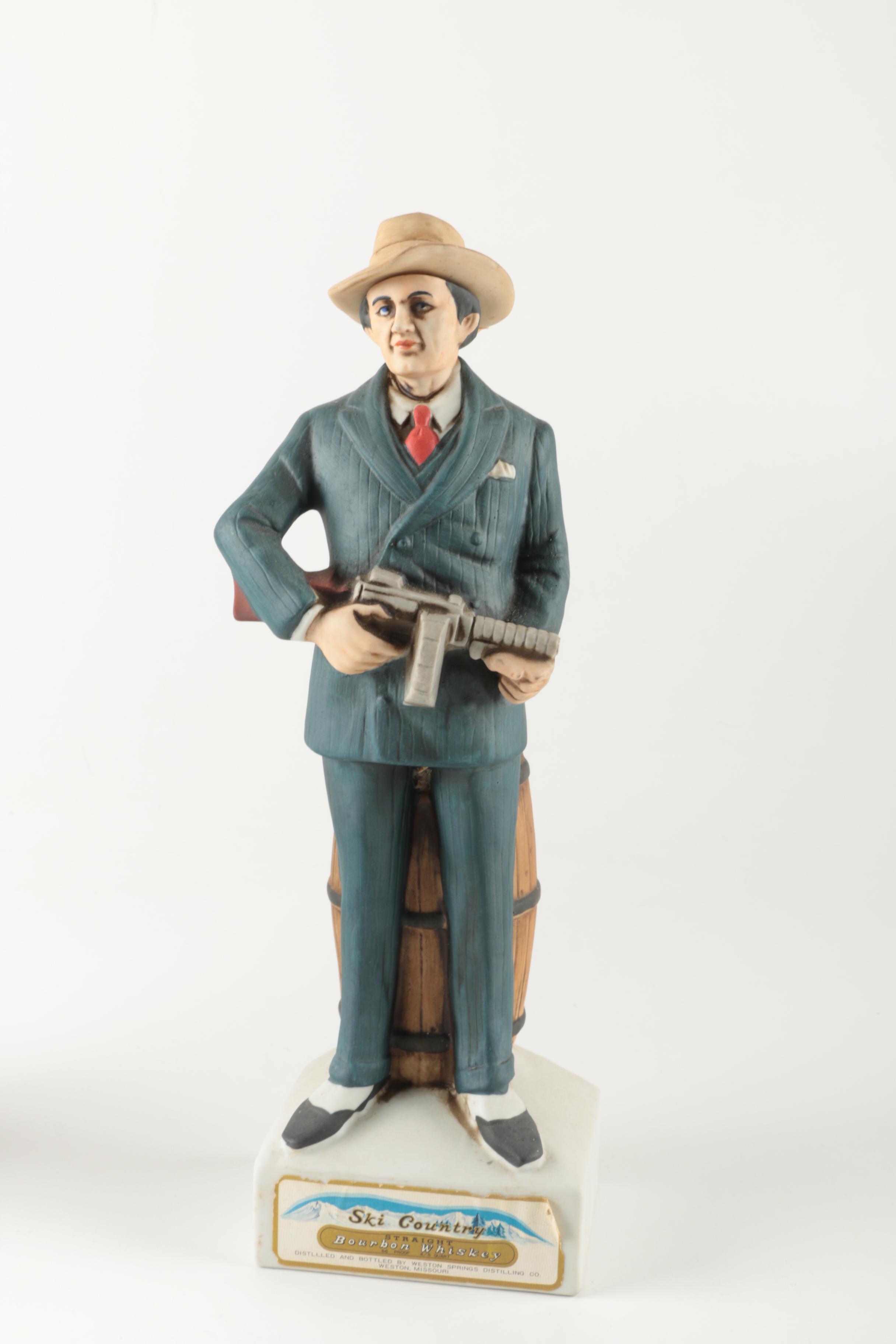 Ski-Country Bonnie and Clyde Series Bourbon Bottles an Figurines