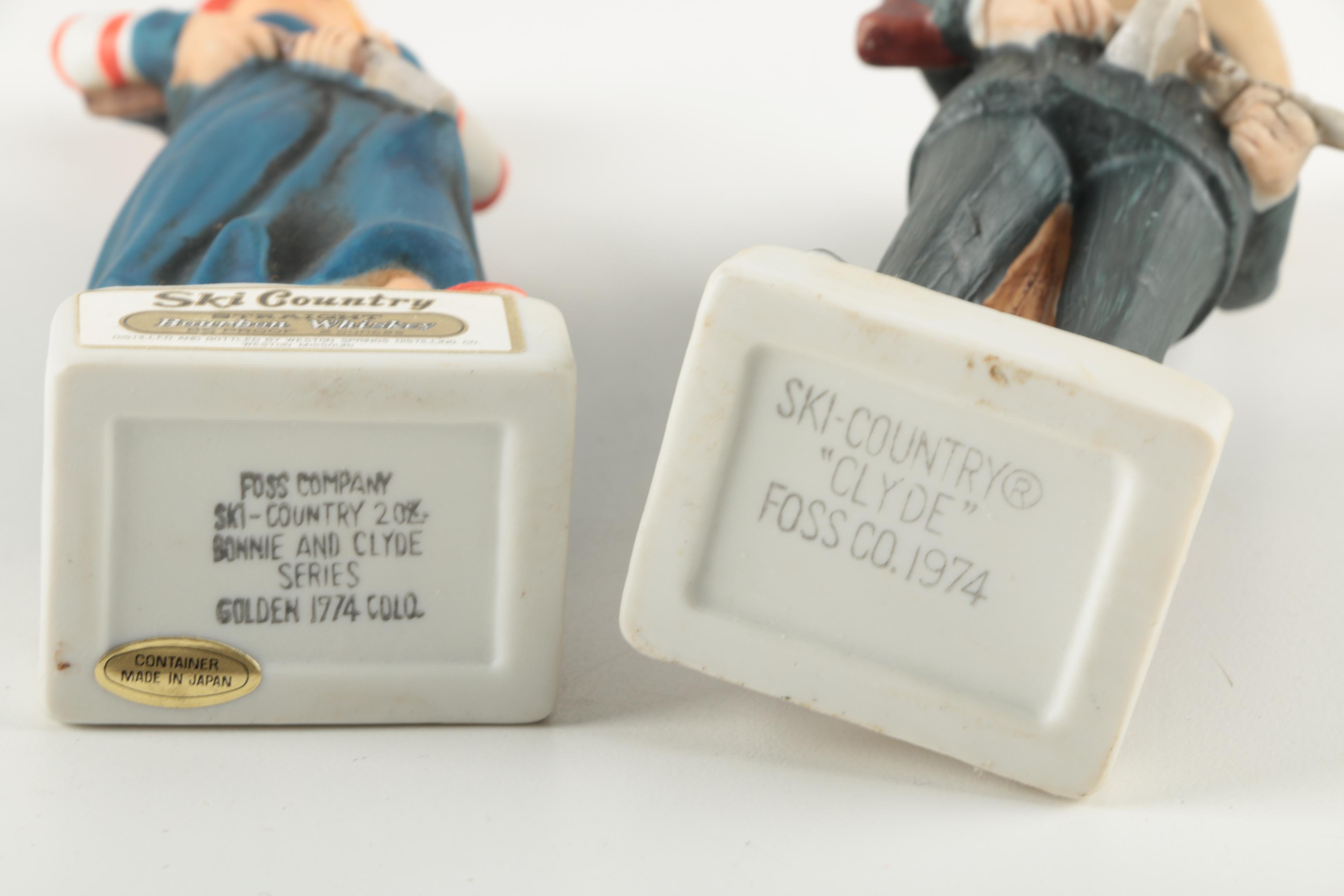 Ski-Country Bonnie and Clyde Series Bourbon Bottles an Figurines