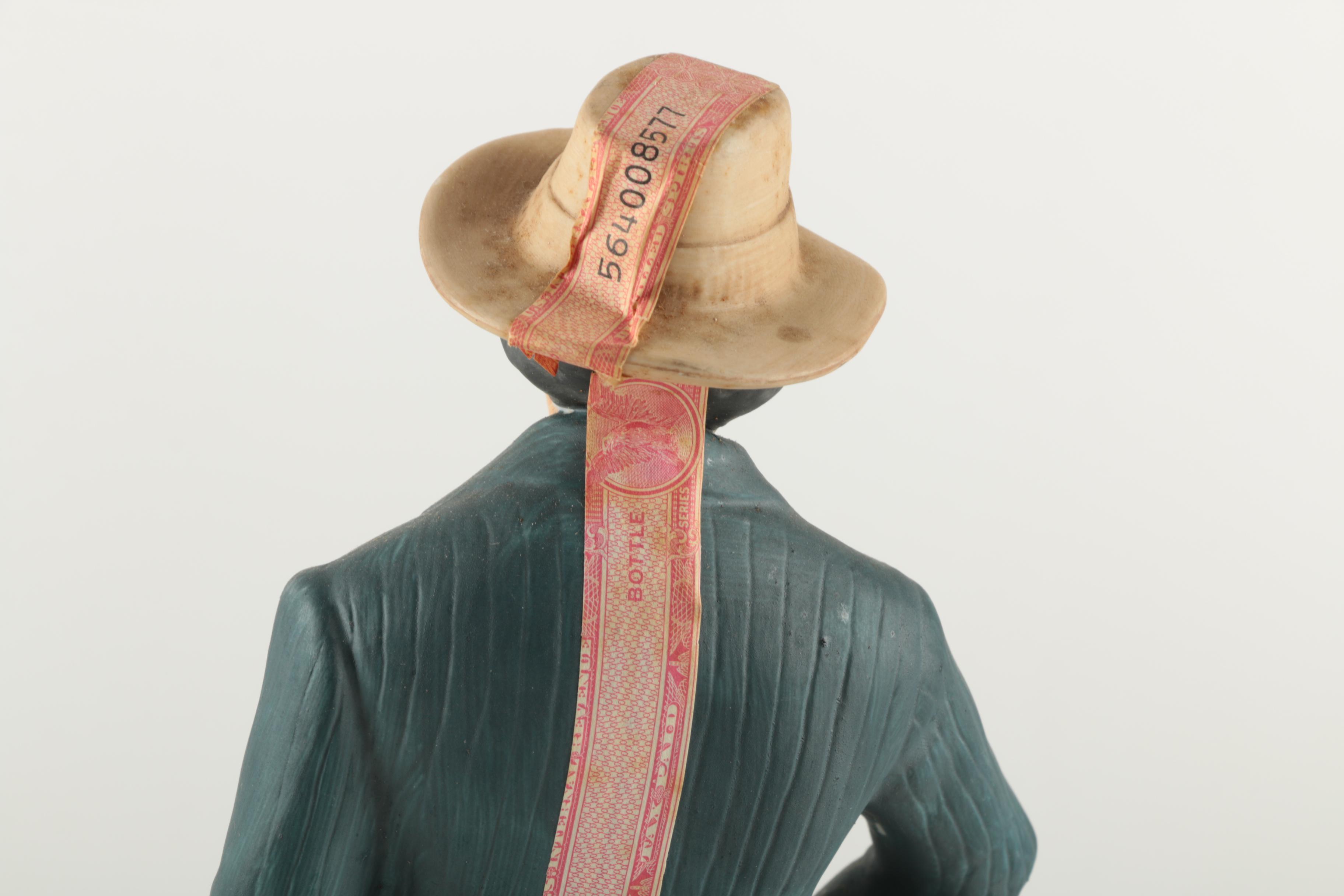 Ski-Country Bonnie and Clyde Series Bourbon Bottles an Figurines