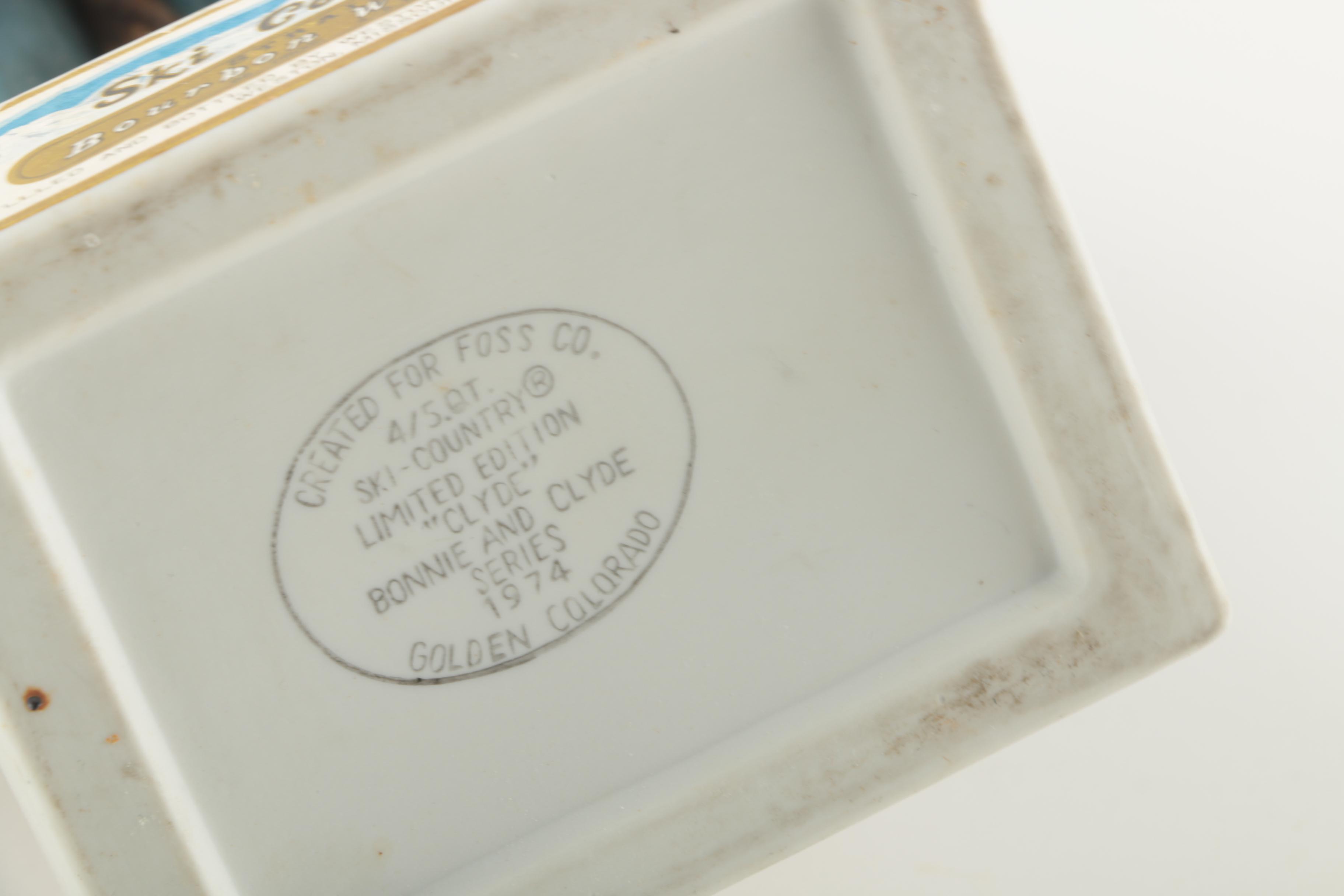 Ski-Country Bonnie and Clyde Series Bourbon Bottles an Figurines