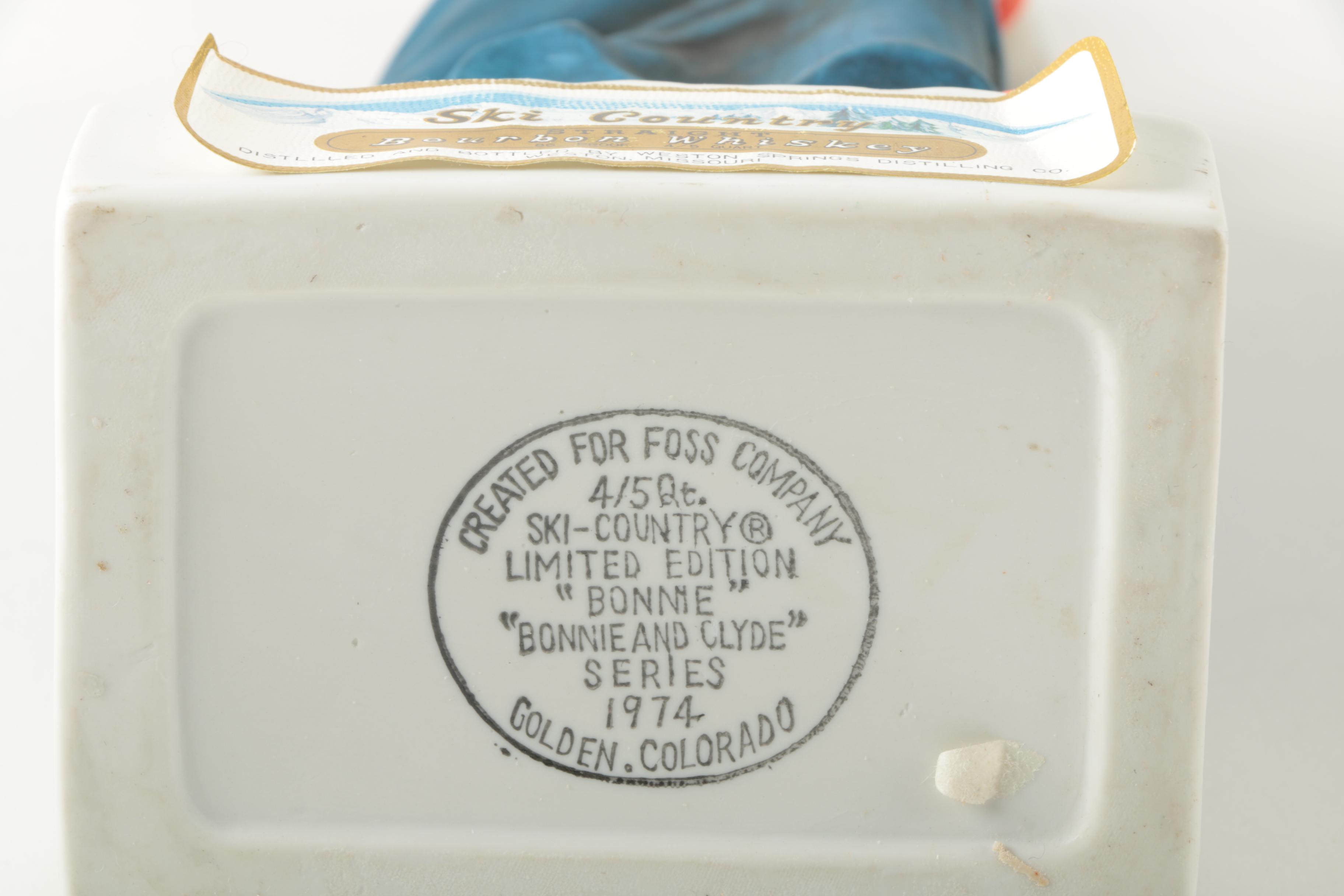 Ski-Country Bonnie and Clyde Series Bourbon Bottles an Figurines