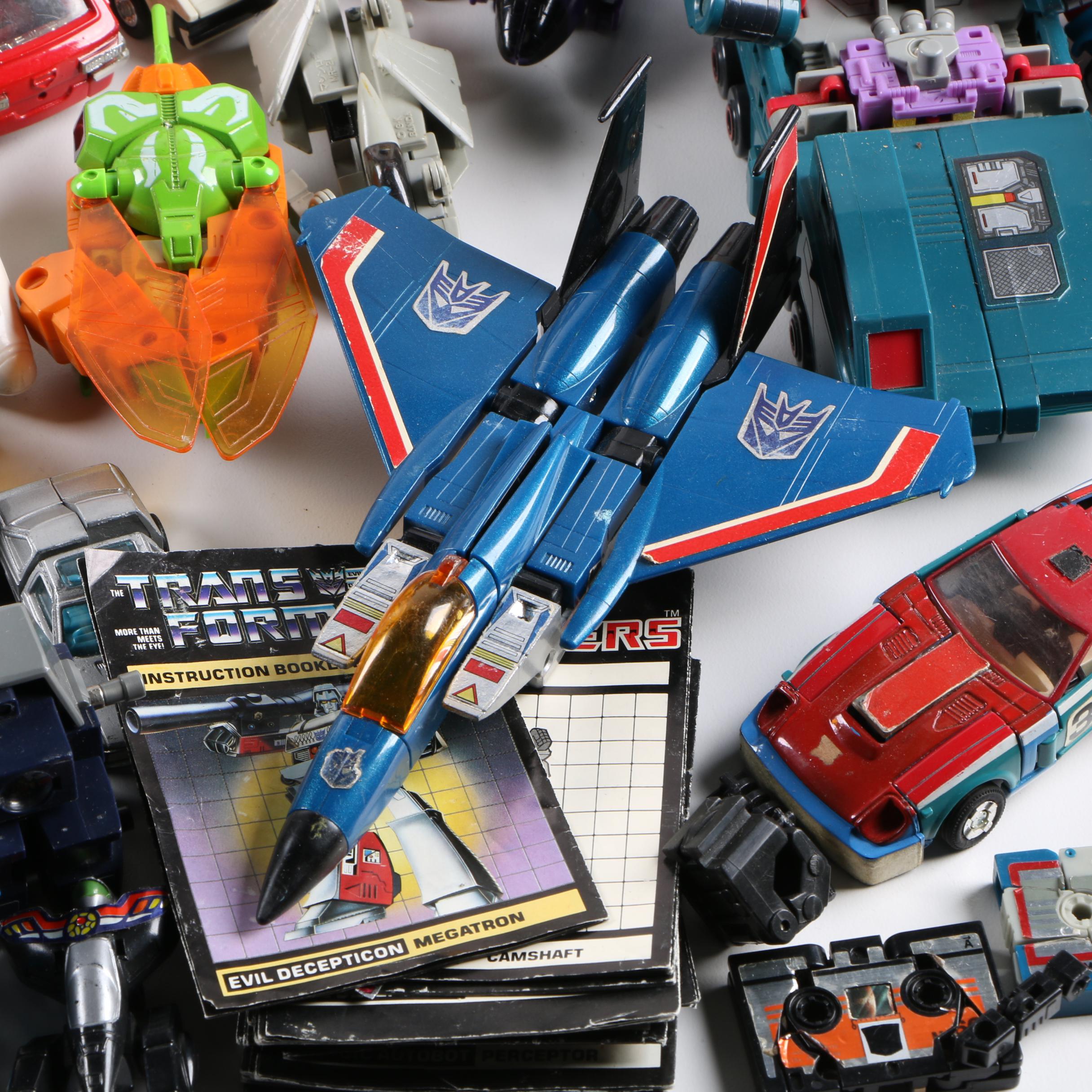 Assortment of 1980s and 1990s Toys Including Transformers