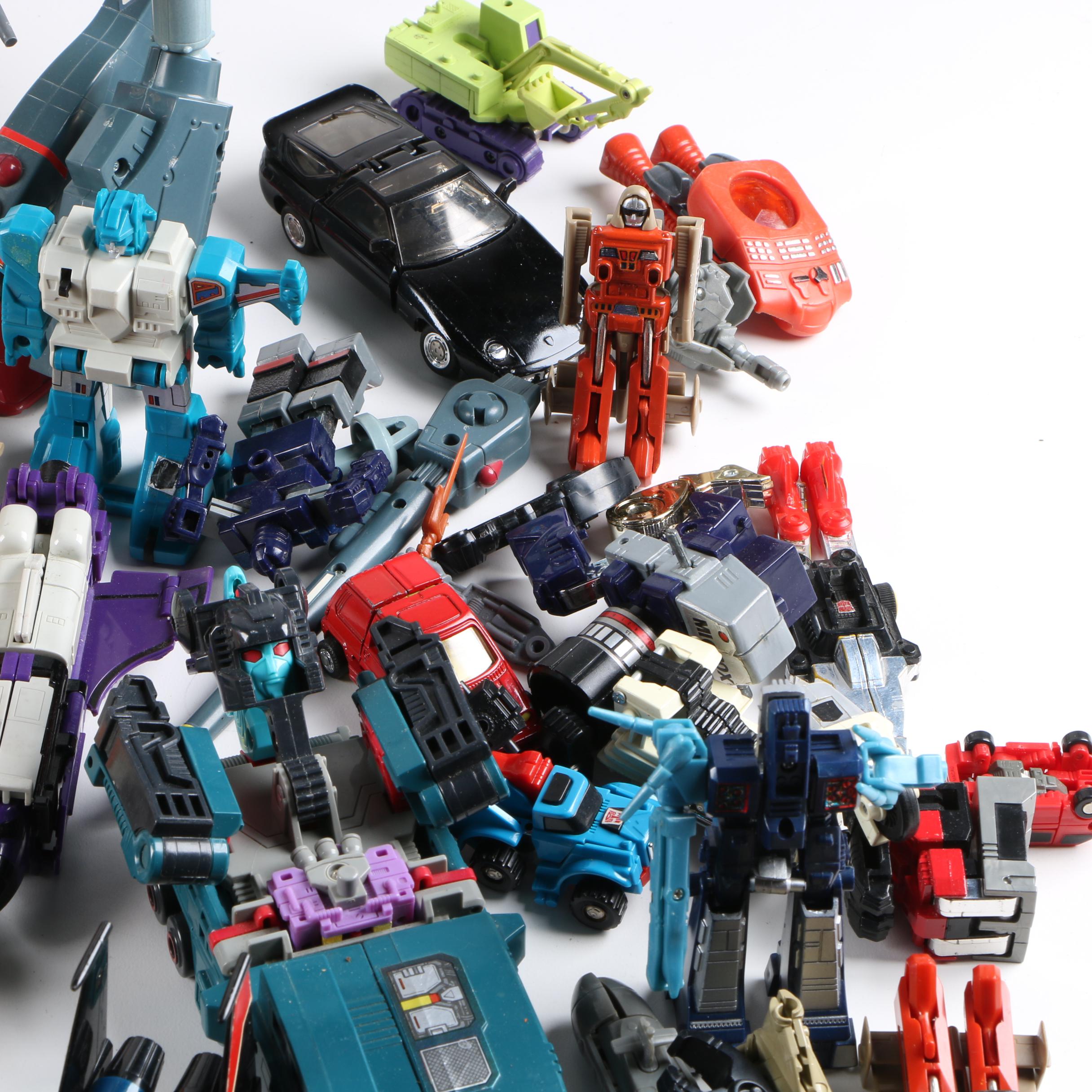 Assortment of 1980s and 1990s Toys Including Transformers