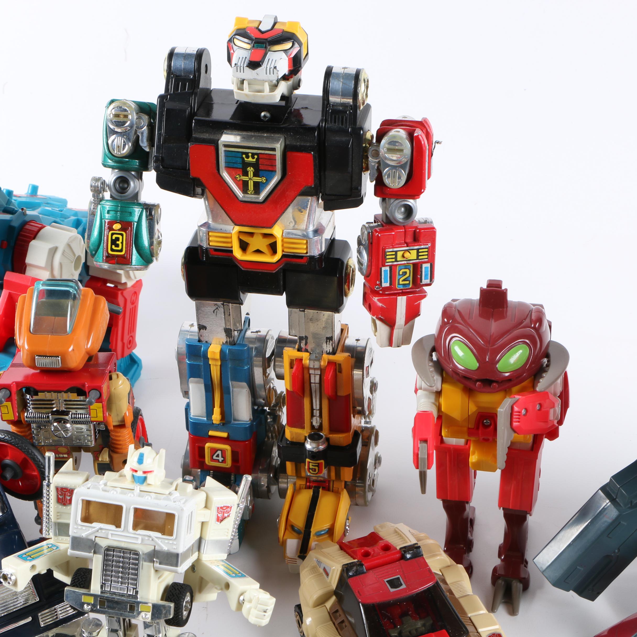Assortment of 1980s and 1990s Toys Including Transformers