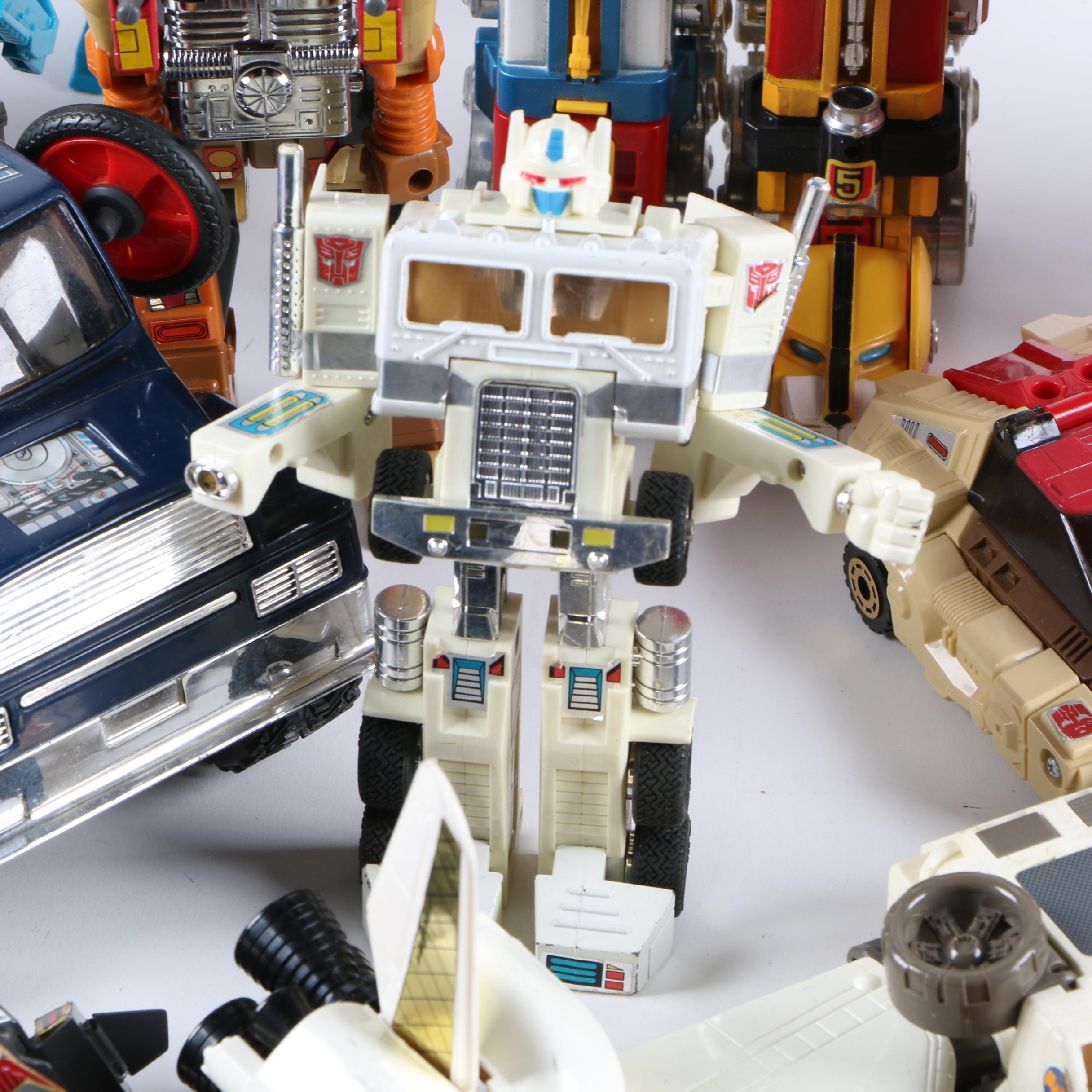 Assortment of 1980s and 1990s Toys Including Transformers