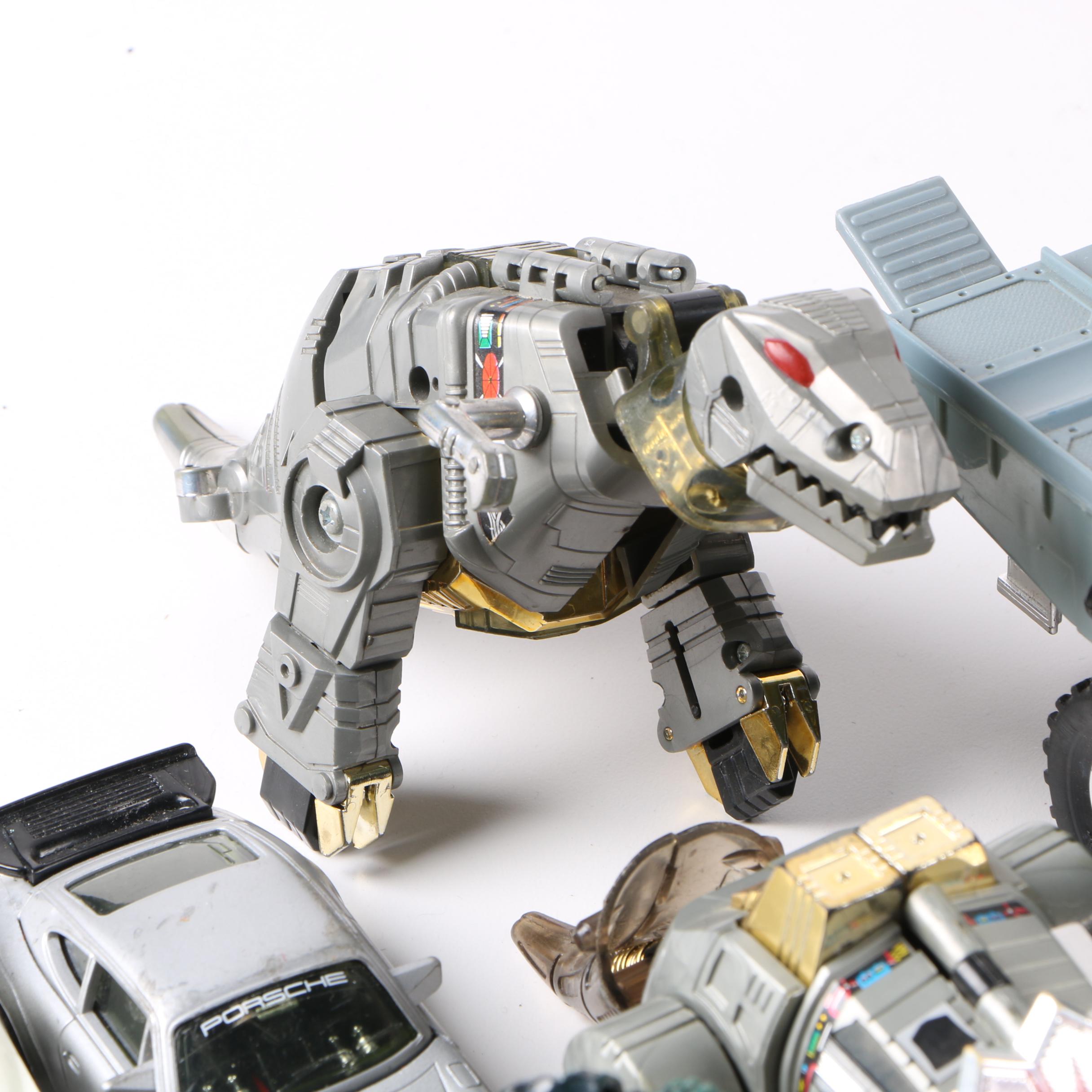 Assortment of 1980s and 1990s Toys Including Transformers