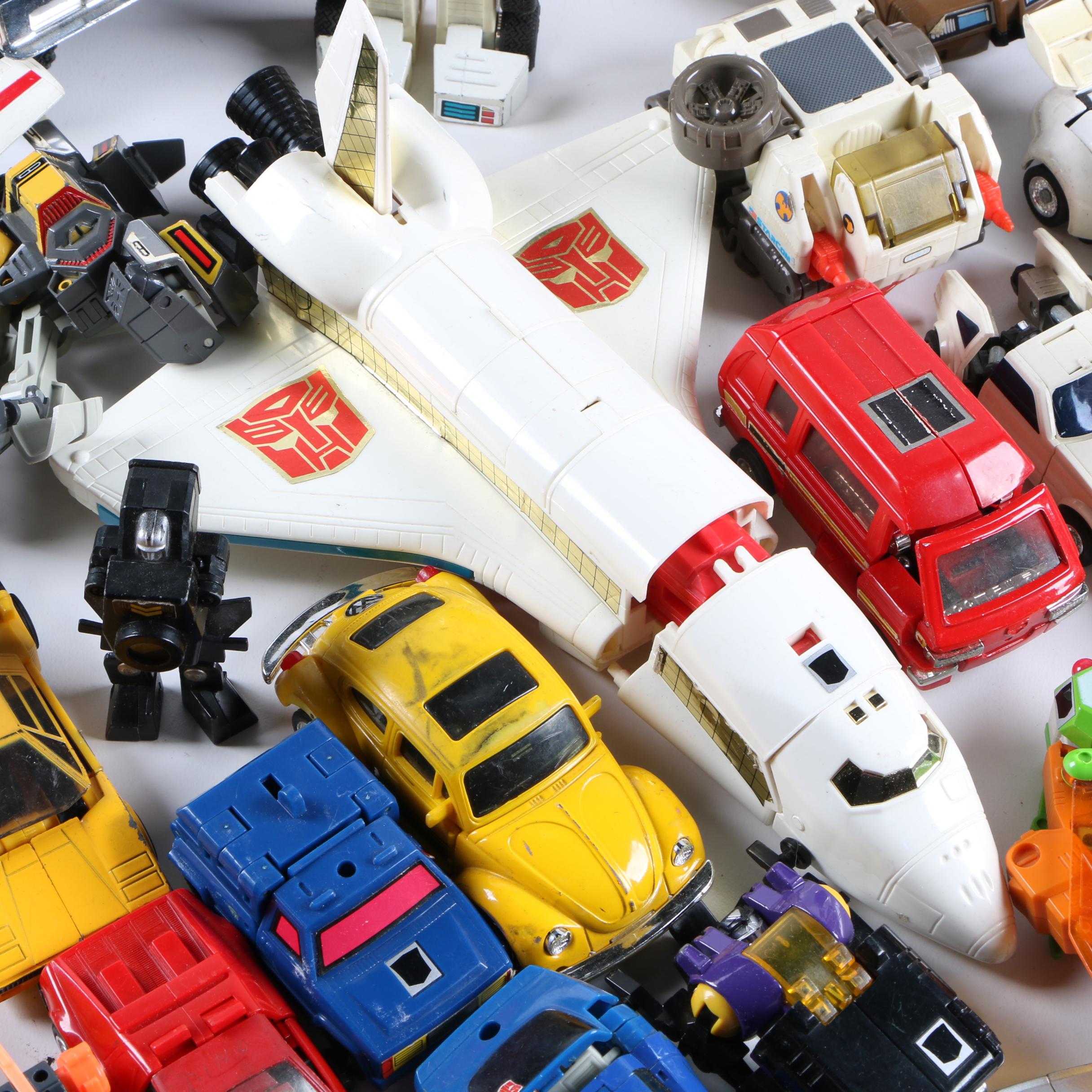 Assortment of 1980s and 1990s Toys Including Transformers