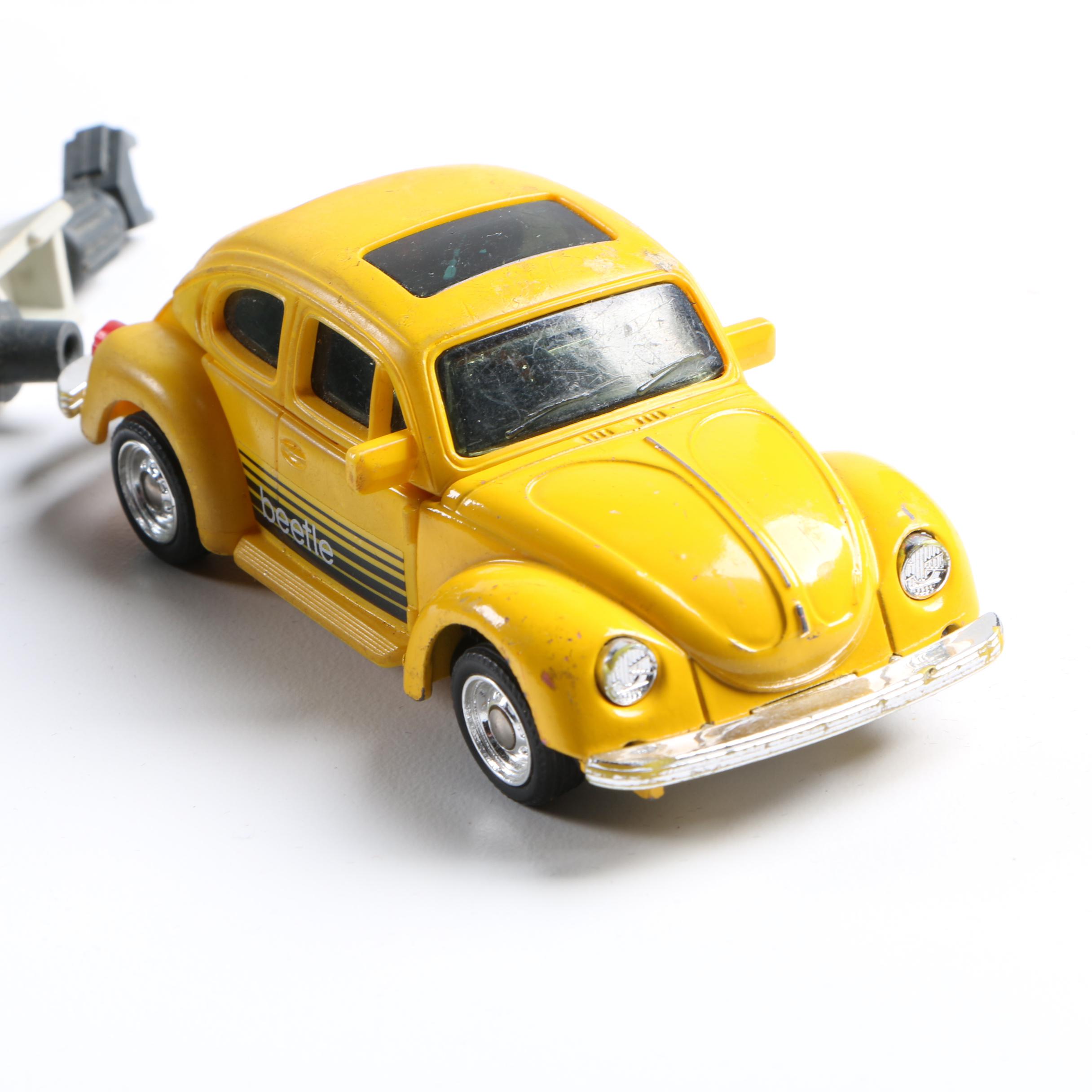 Assortment of 1980s and 1990s Toys Including Transformers