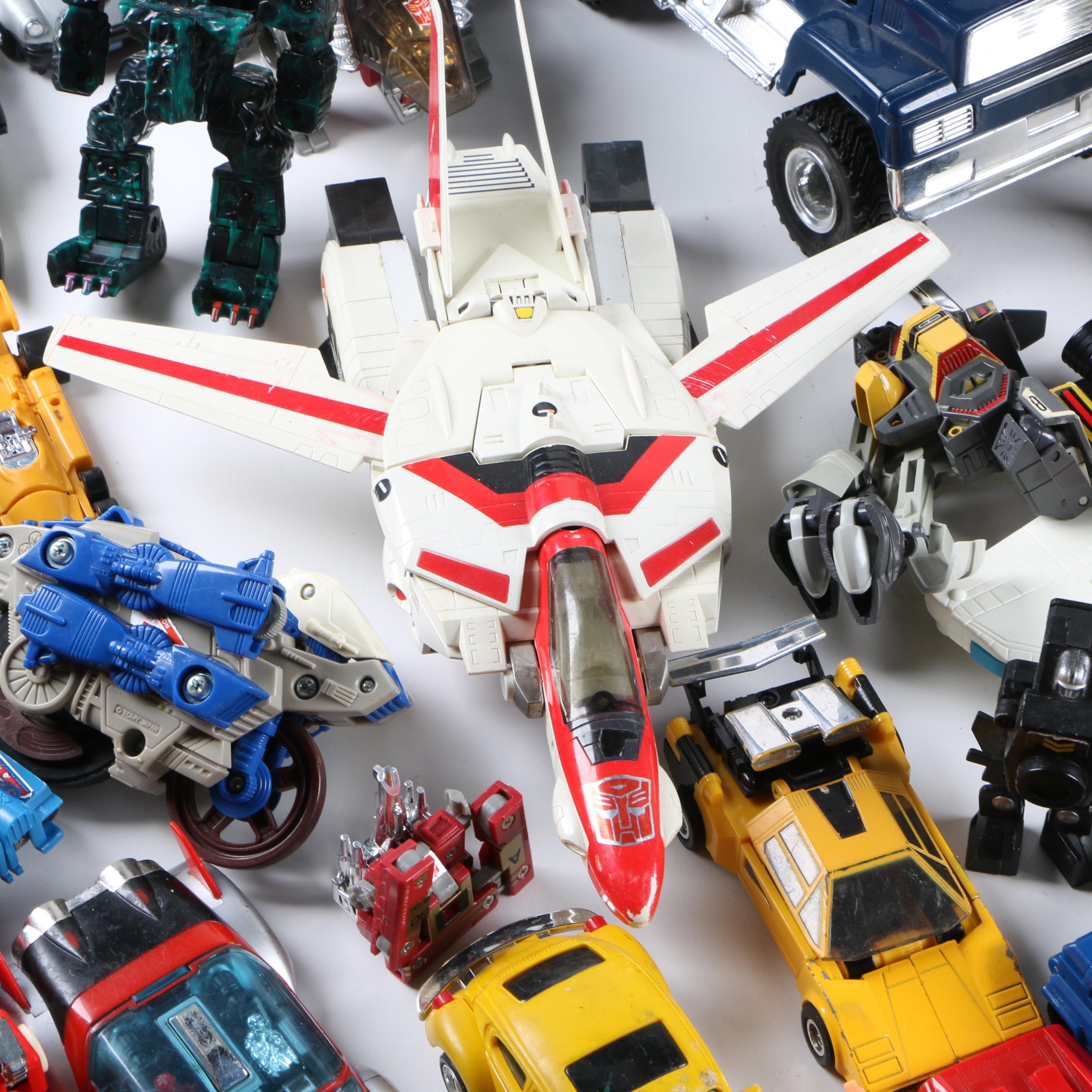 Assortment of 1980s and 1990s Toys Including Transformers