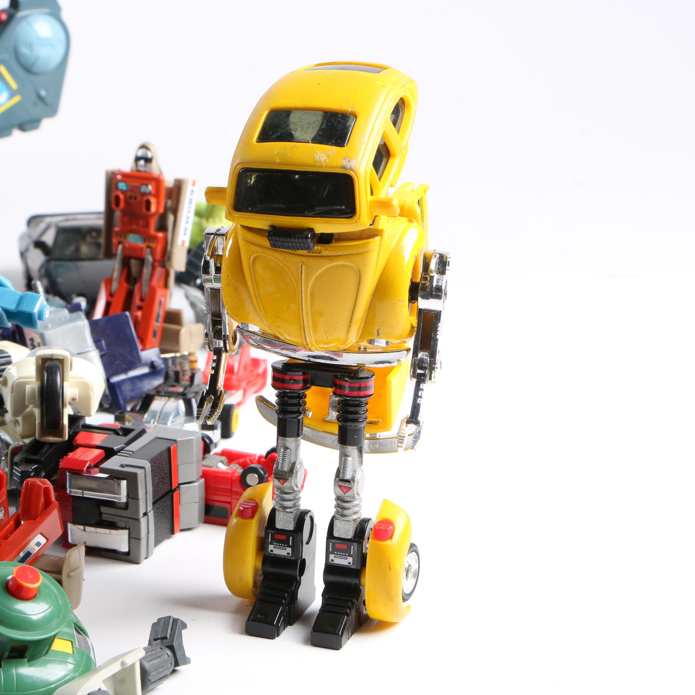 Assortment of 1980s and 1990s Toys Including Transformers