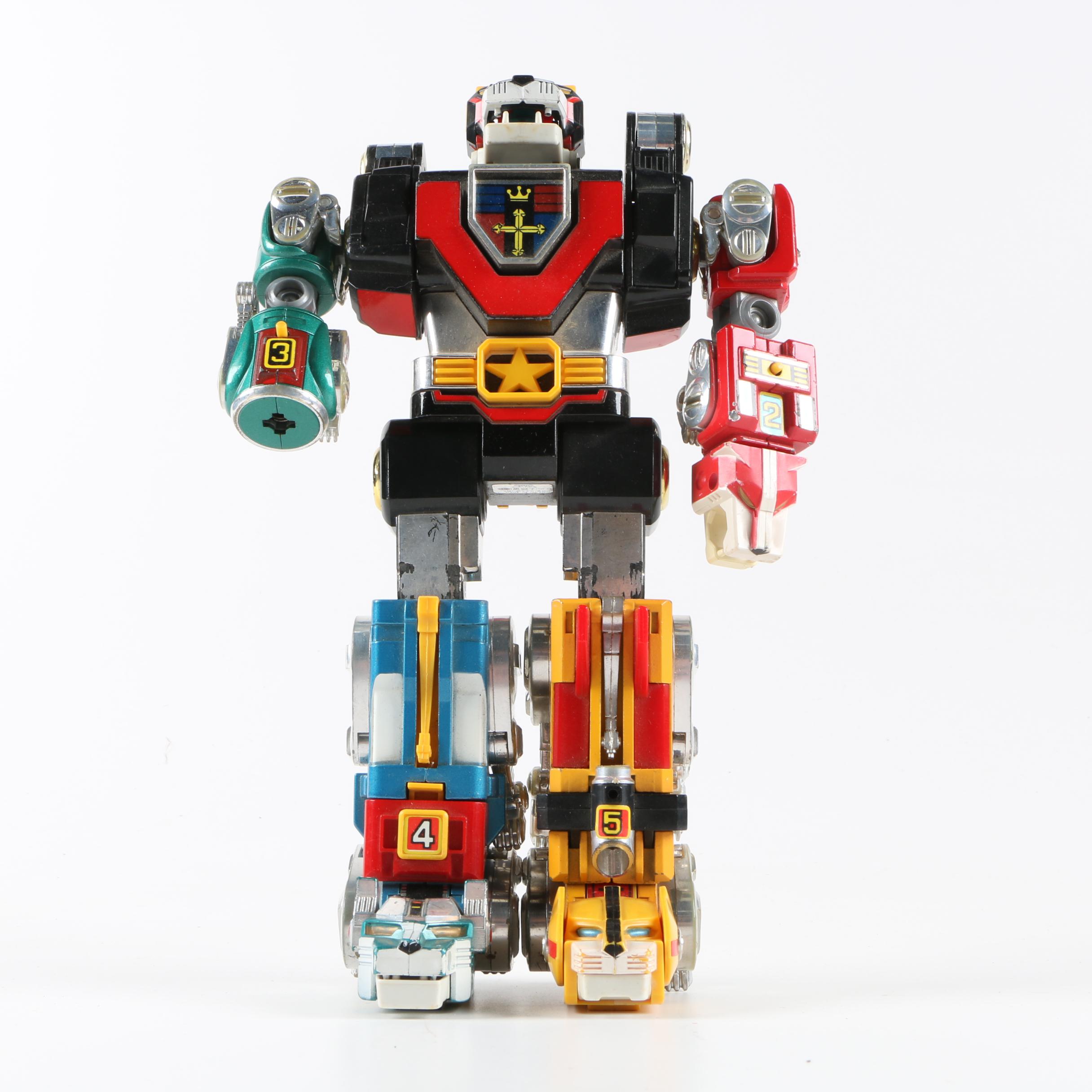 Assortment of 1980s and 1990s Toys Including Transformers