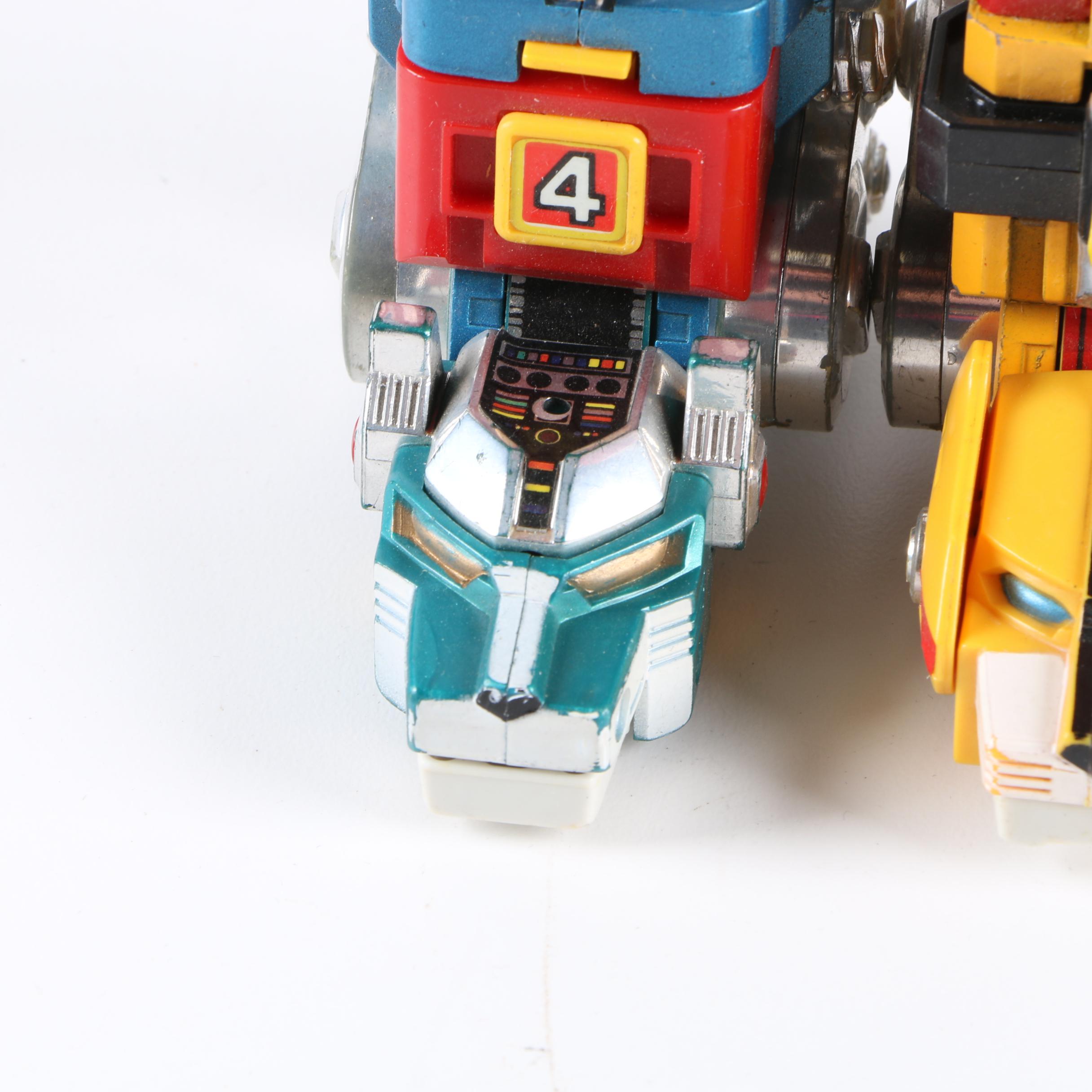 Assortment of 1980s and 1990s Toys Including Transformers