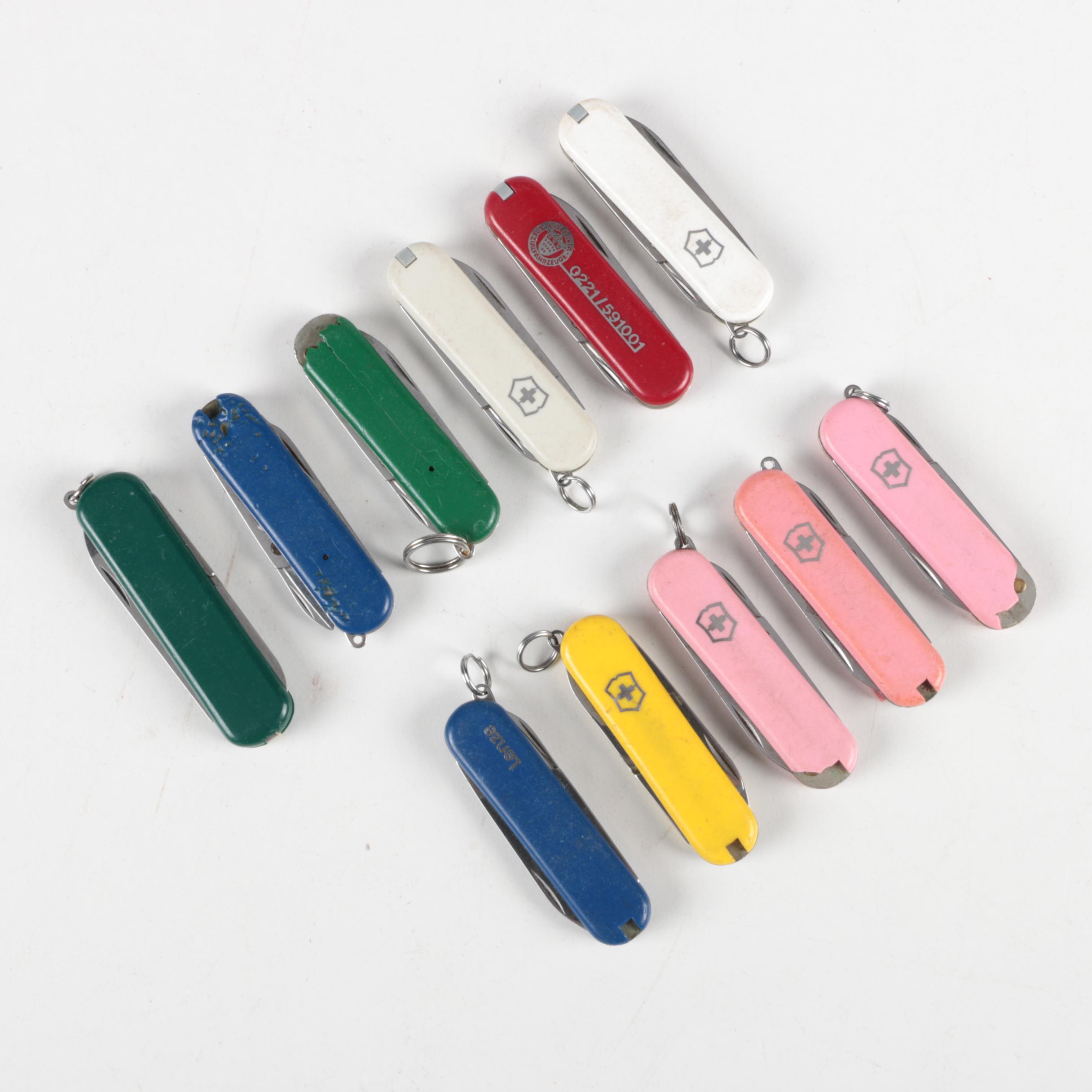 Assortment of Small Swiss Army Utility Pocket Knives