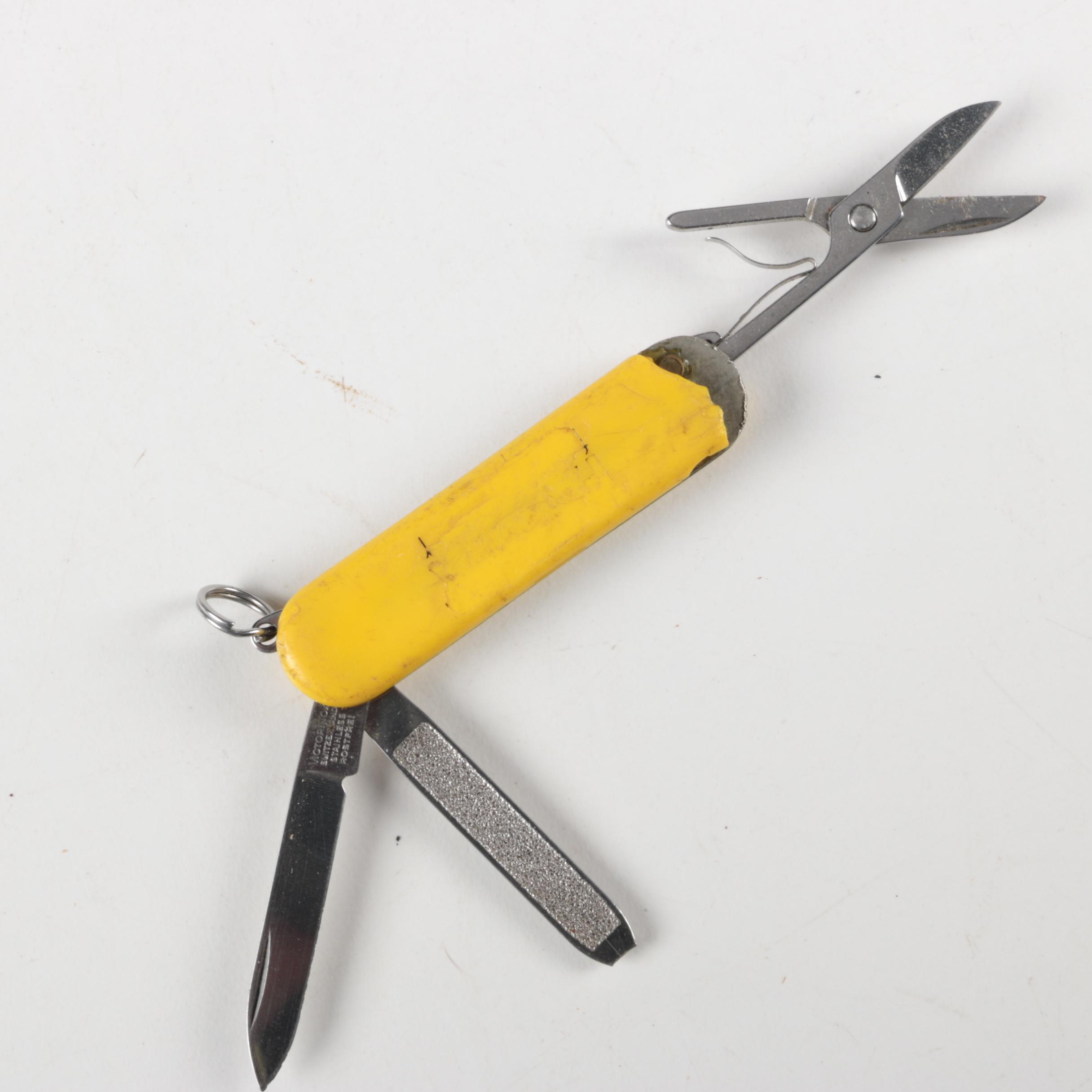 Assortment of Small Swiss Army Utility Pocket Knives