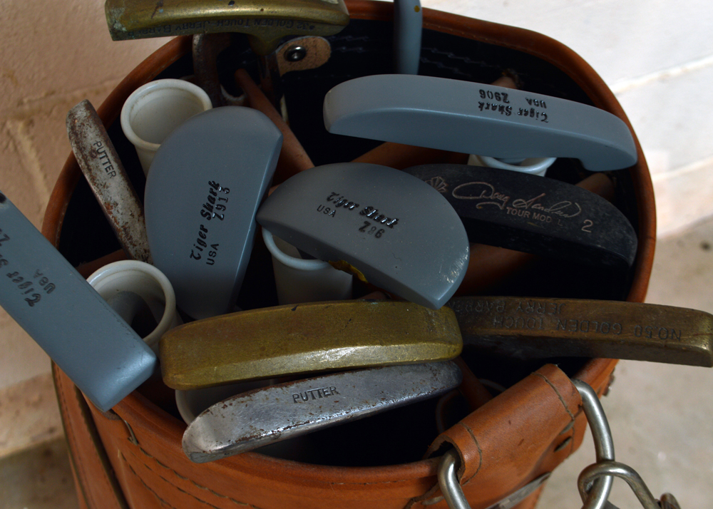 Collection of Putters in Leather Golf Bag