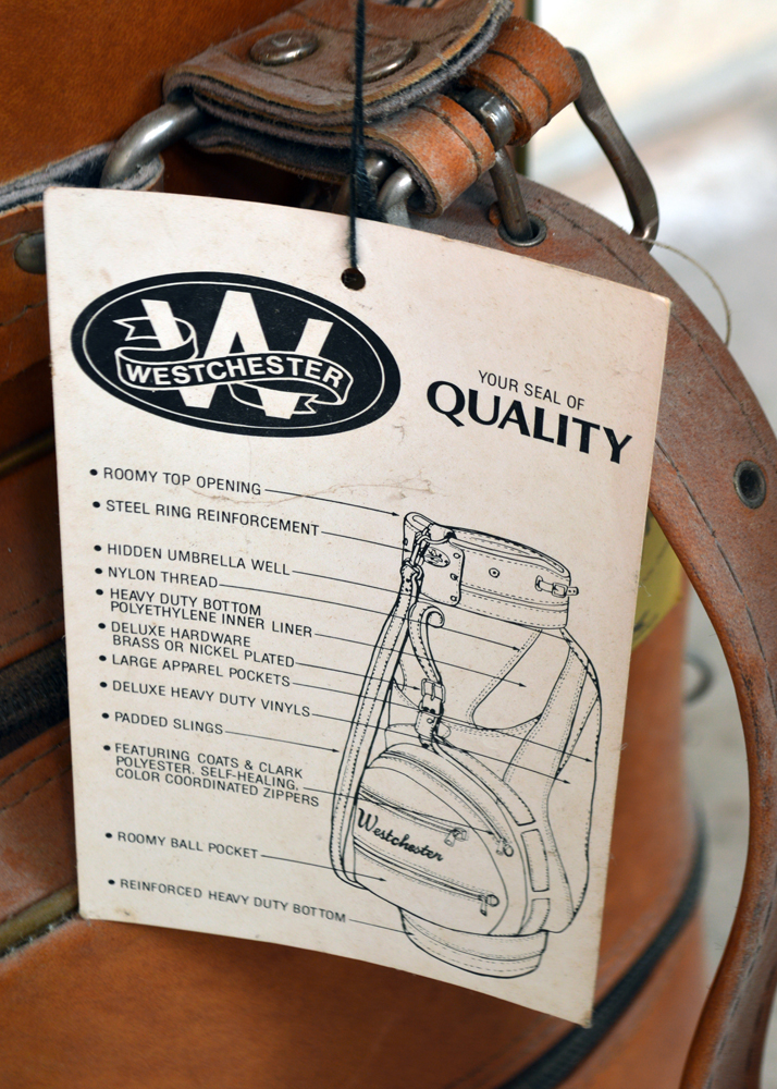 Collection of Putters in Leather Golf Bag