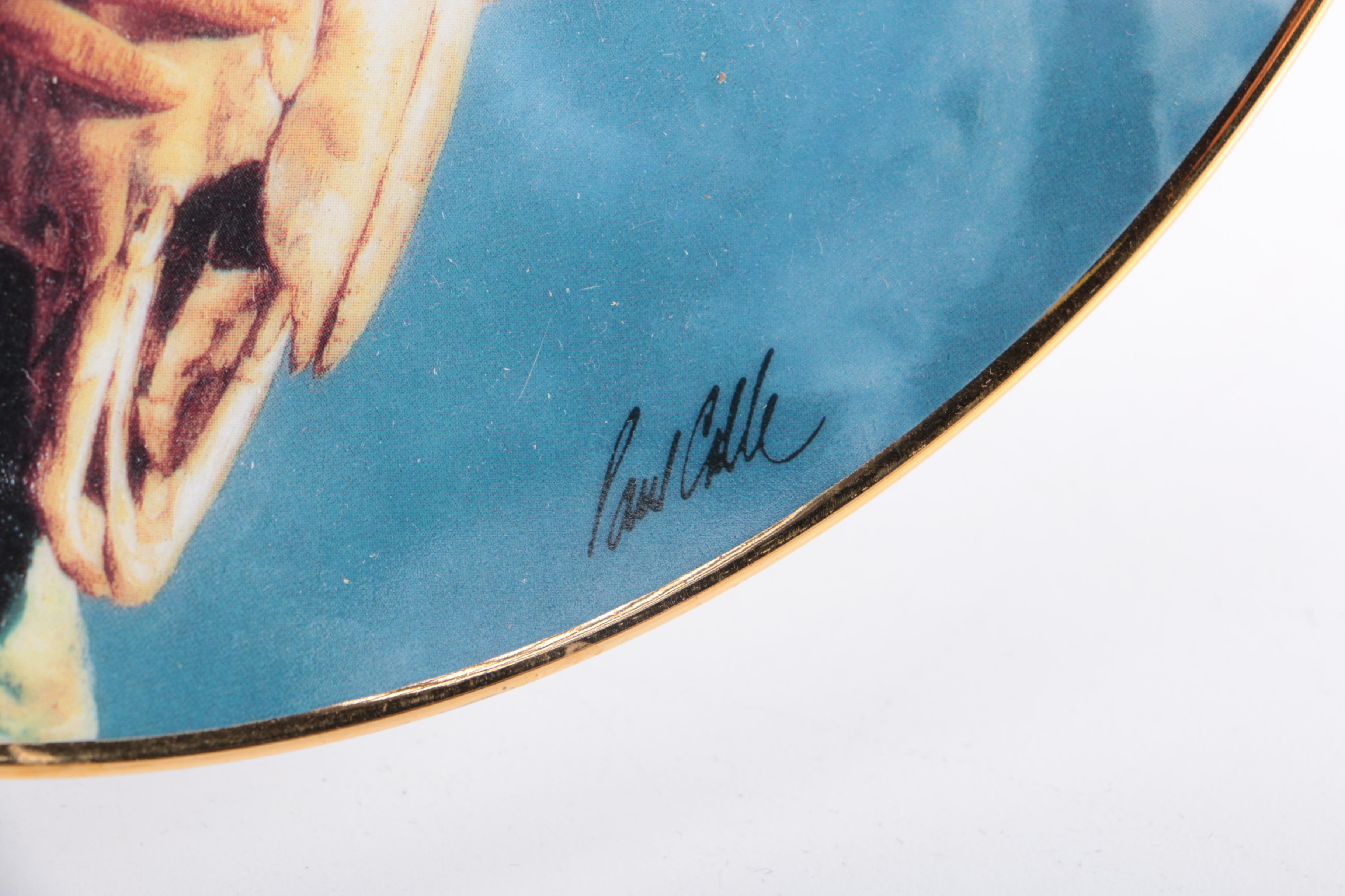 Assorted Collectible Plates and Mugs Featuring Norman Rockwell