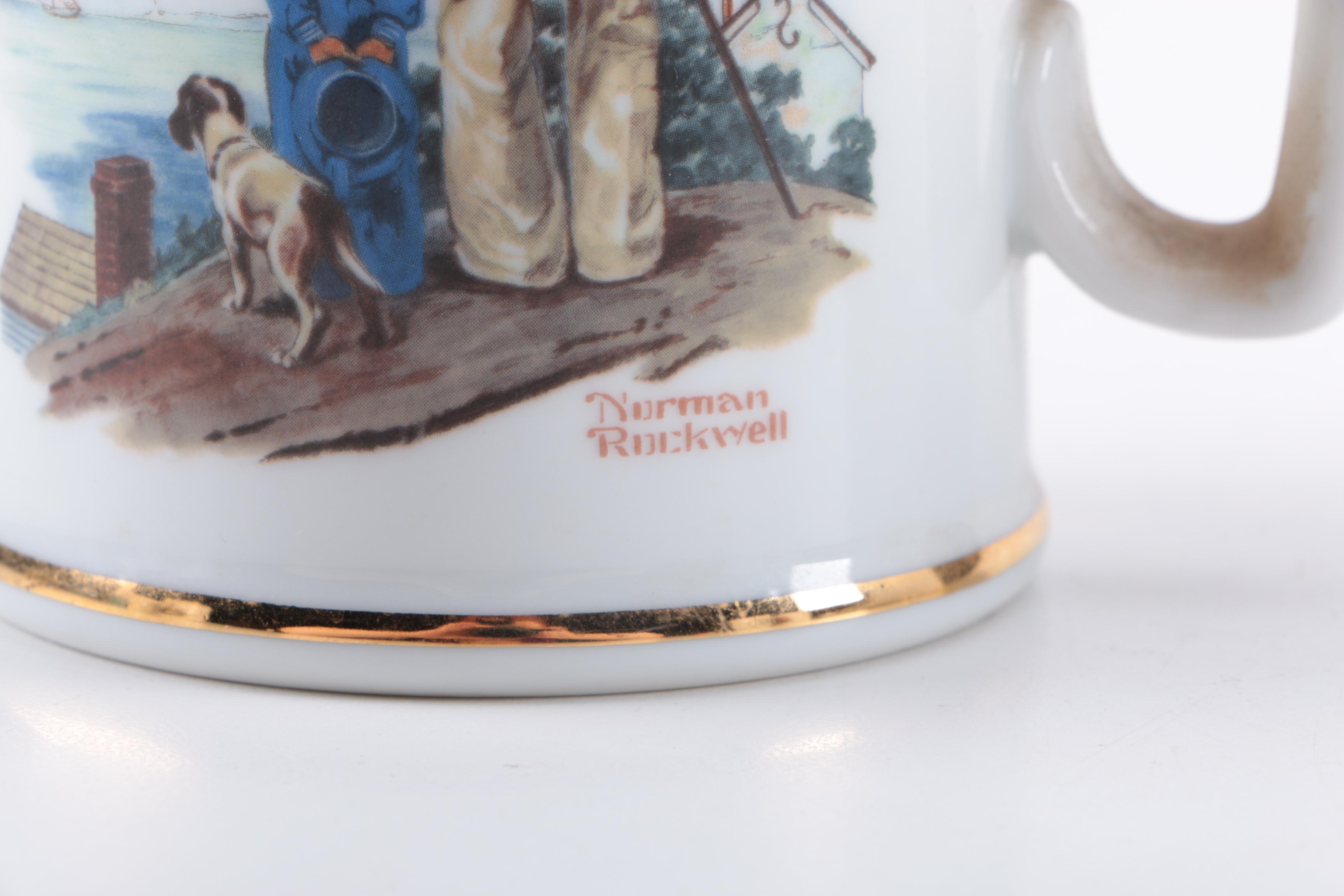 Assorted Collectible Plates and Mugs Featuring Norman Rockwell