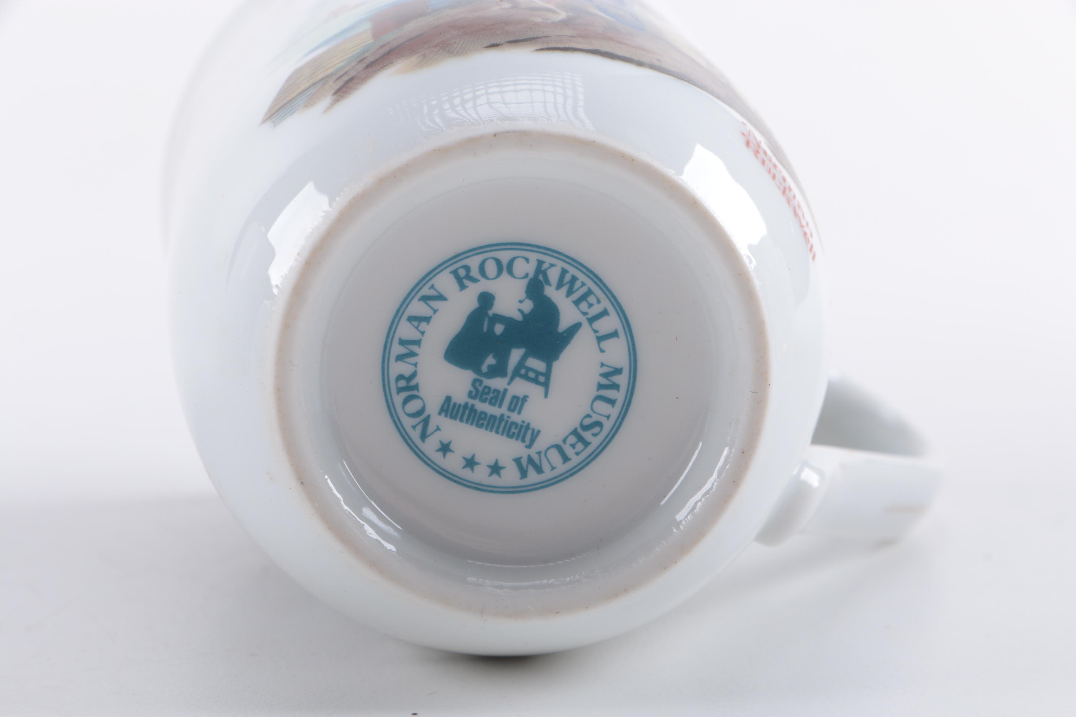 Assorted Collectible Plates and Mugs Featuring Norman Rockwell