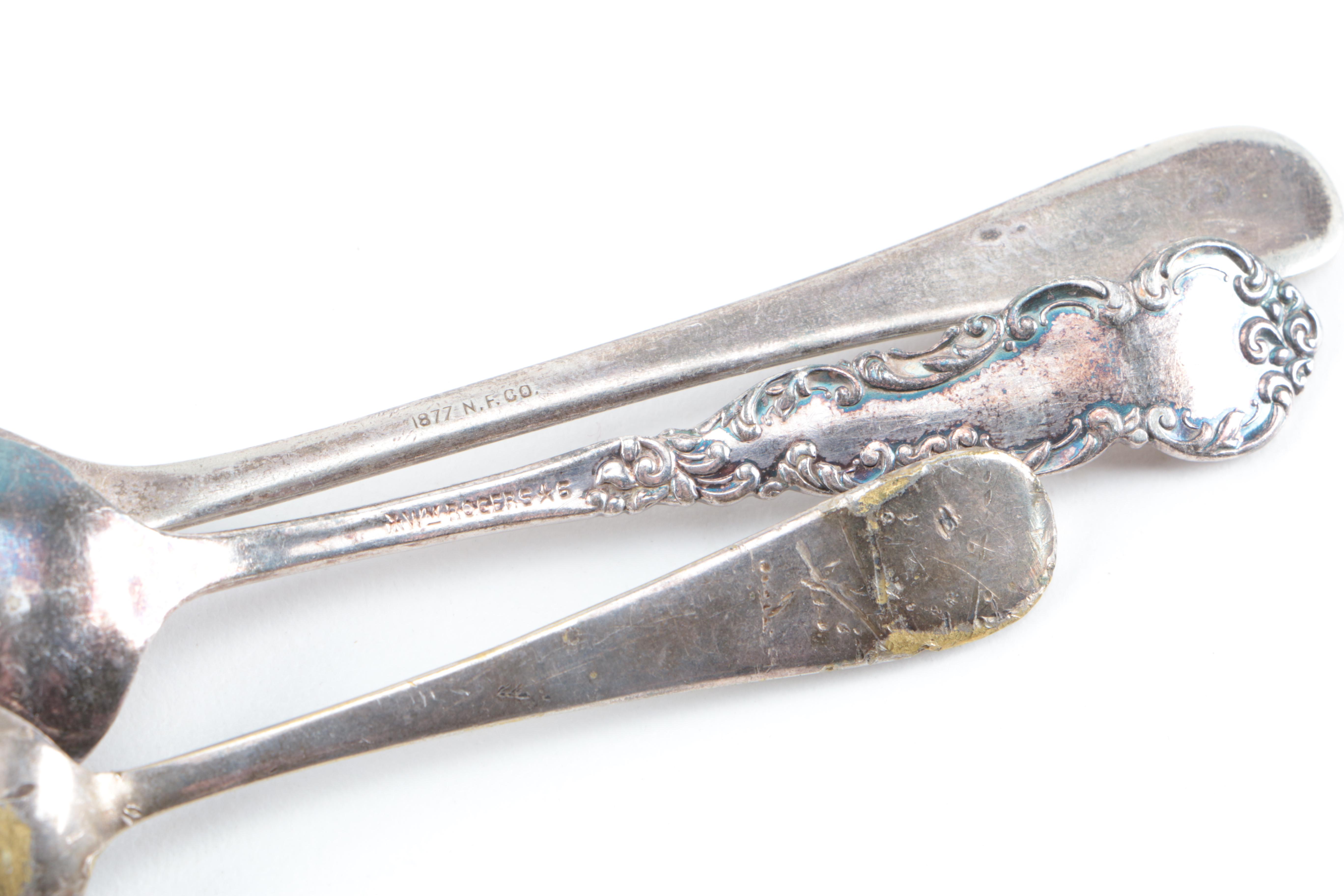 Assorted Silver-Plated and Stainless Steel Utensils Featuring Oneida