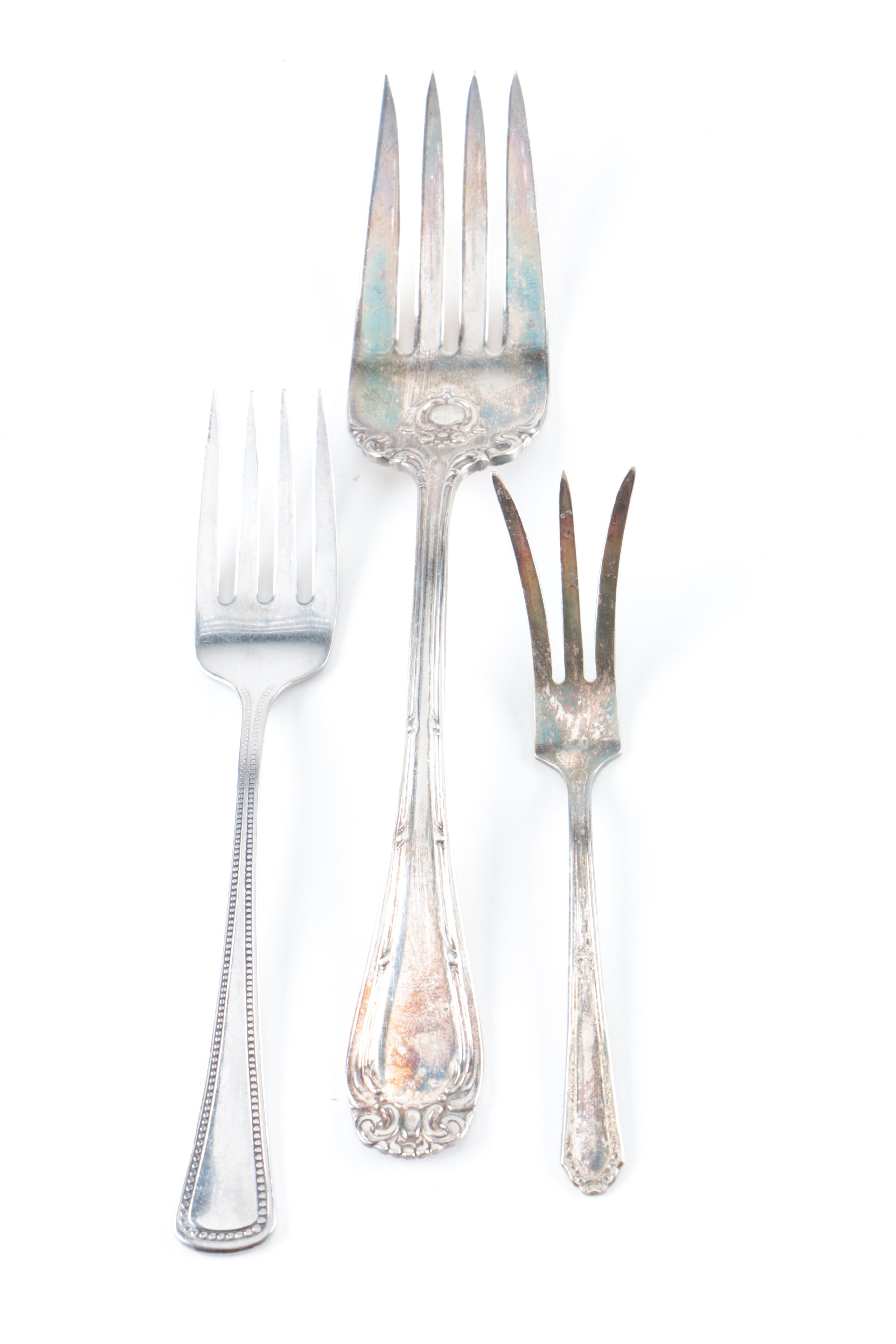 Assorted Silver-Plated and Stainless Steel Utensils Featuring Oneida