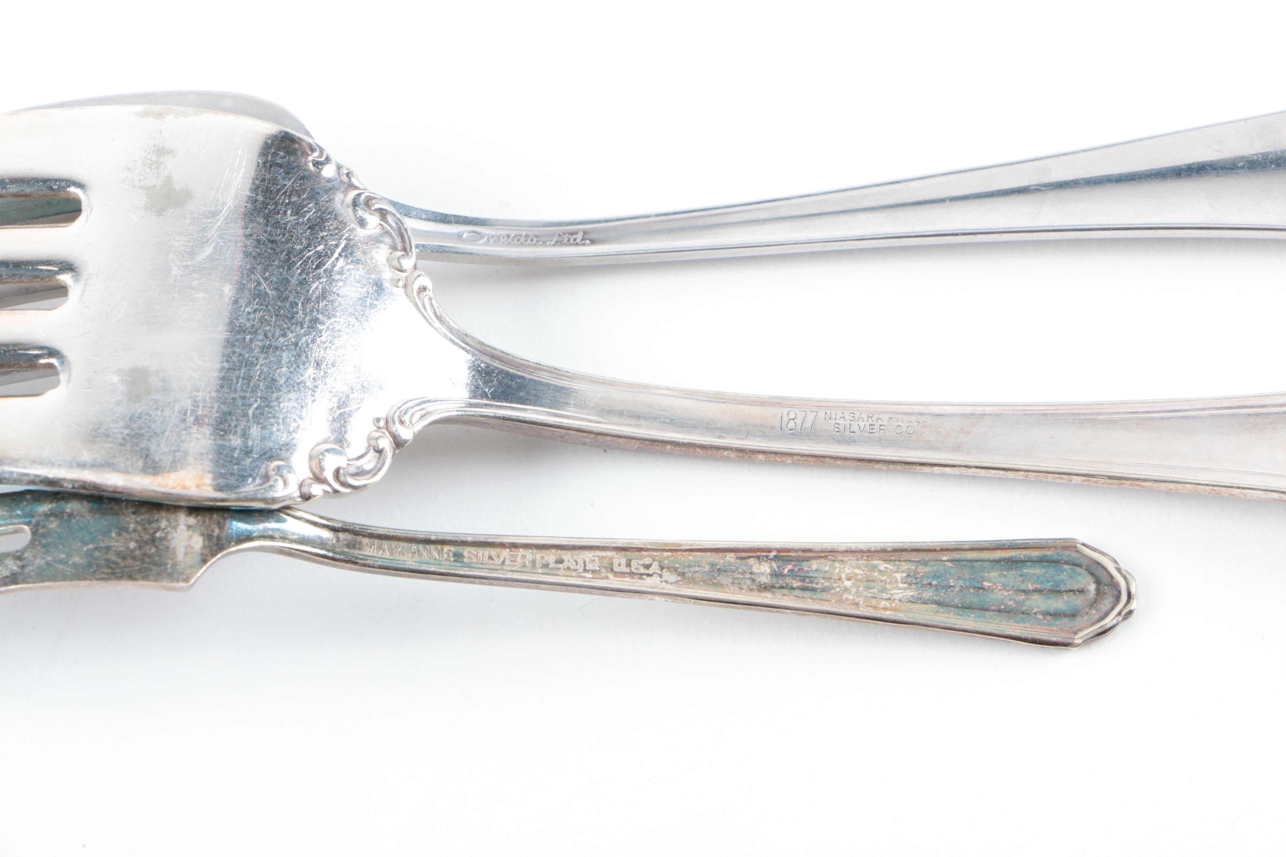 Assorted Silver-Plated and Stainless Steel Utensils Featuring Oneida