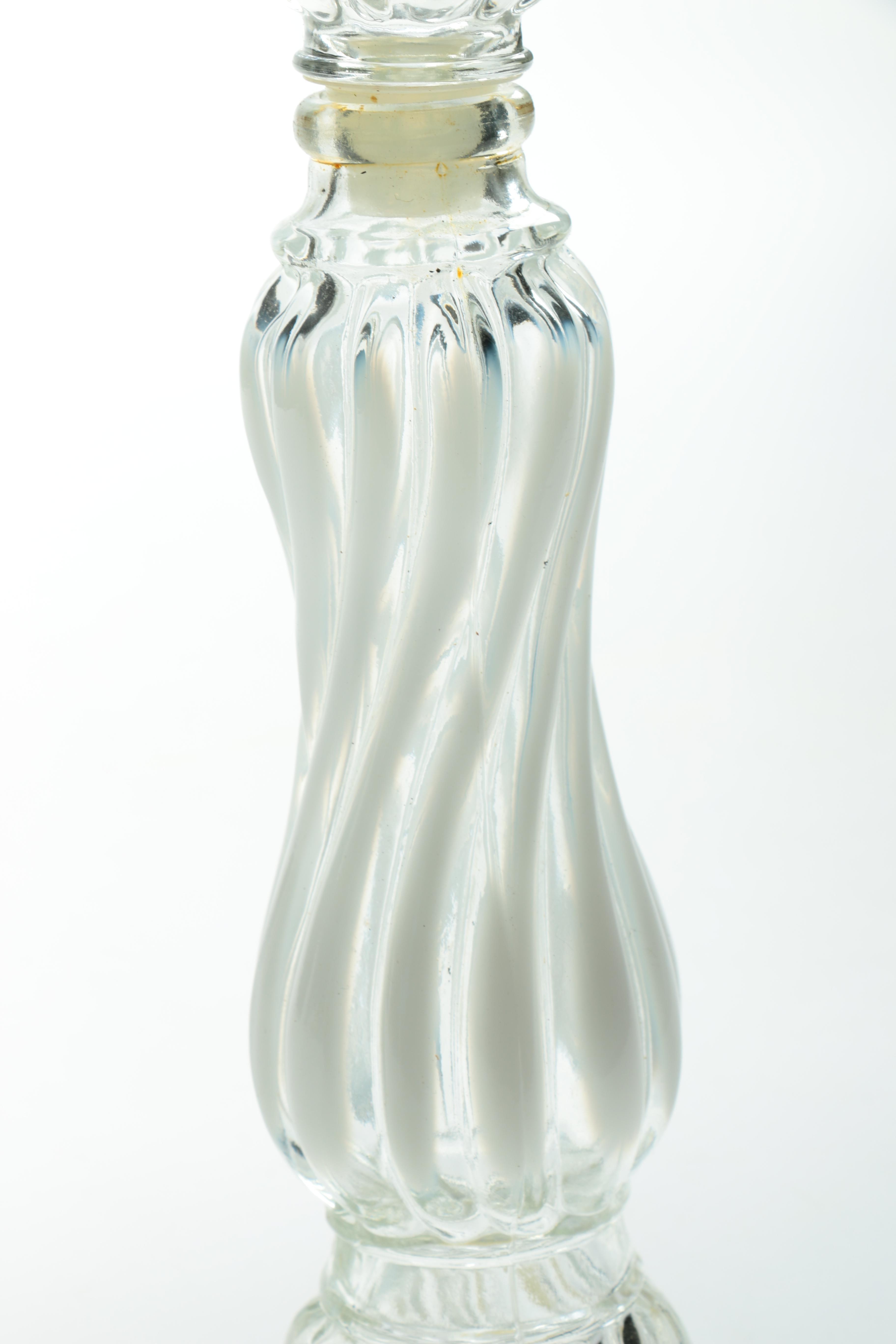 Pair of Avon "Opalique Candlestick" Charisma Cologne Decanters