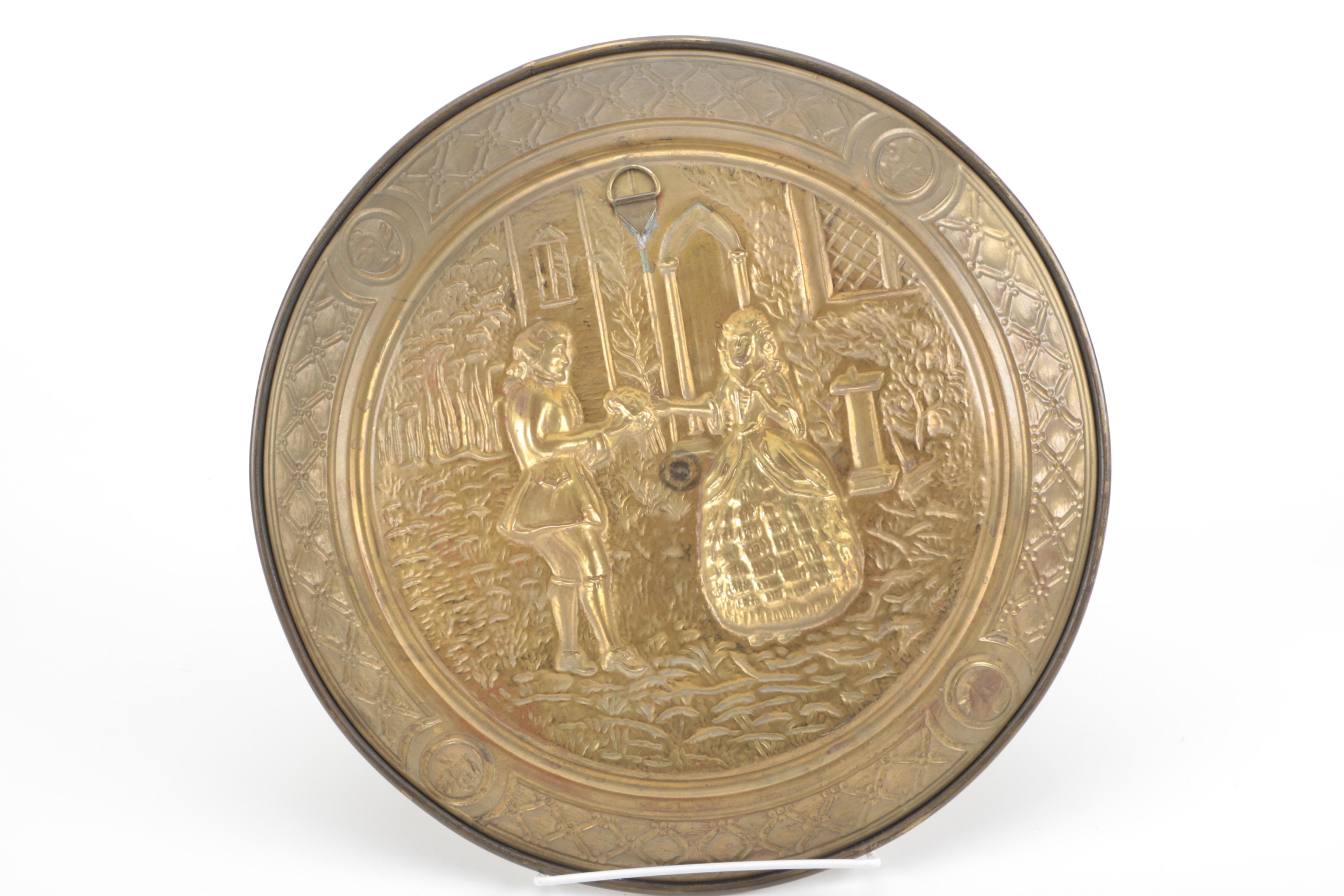 Four Decorative Brass Platters