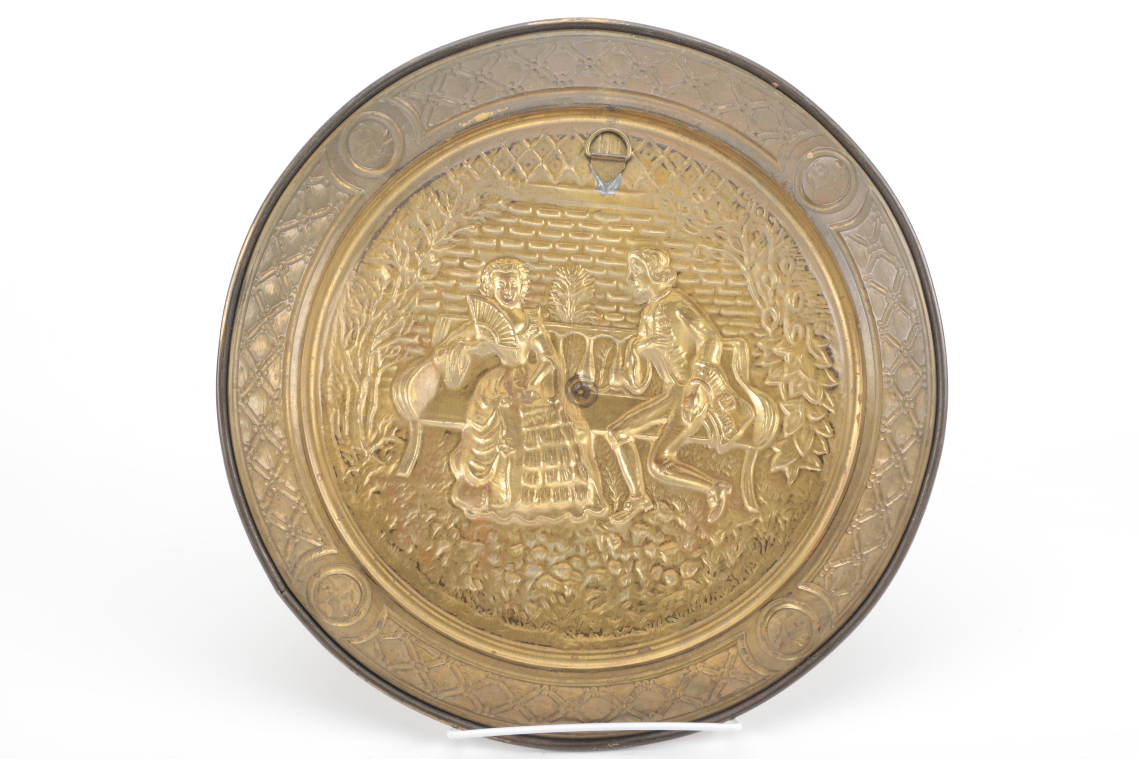 Four Decorative Brass Platters