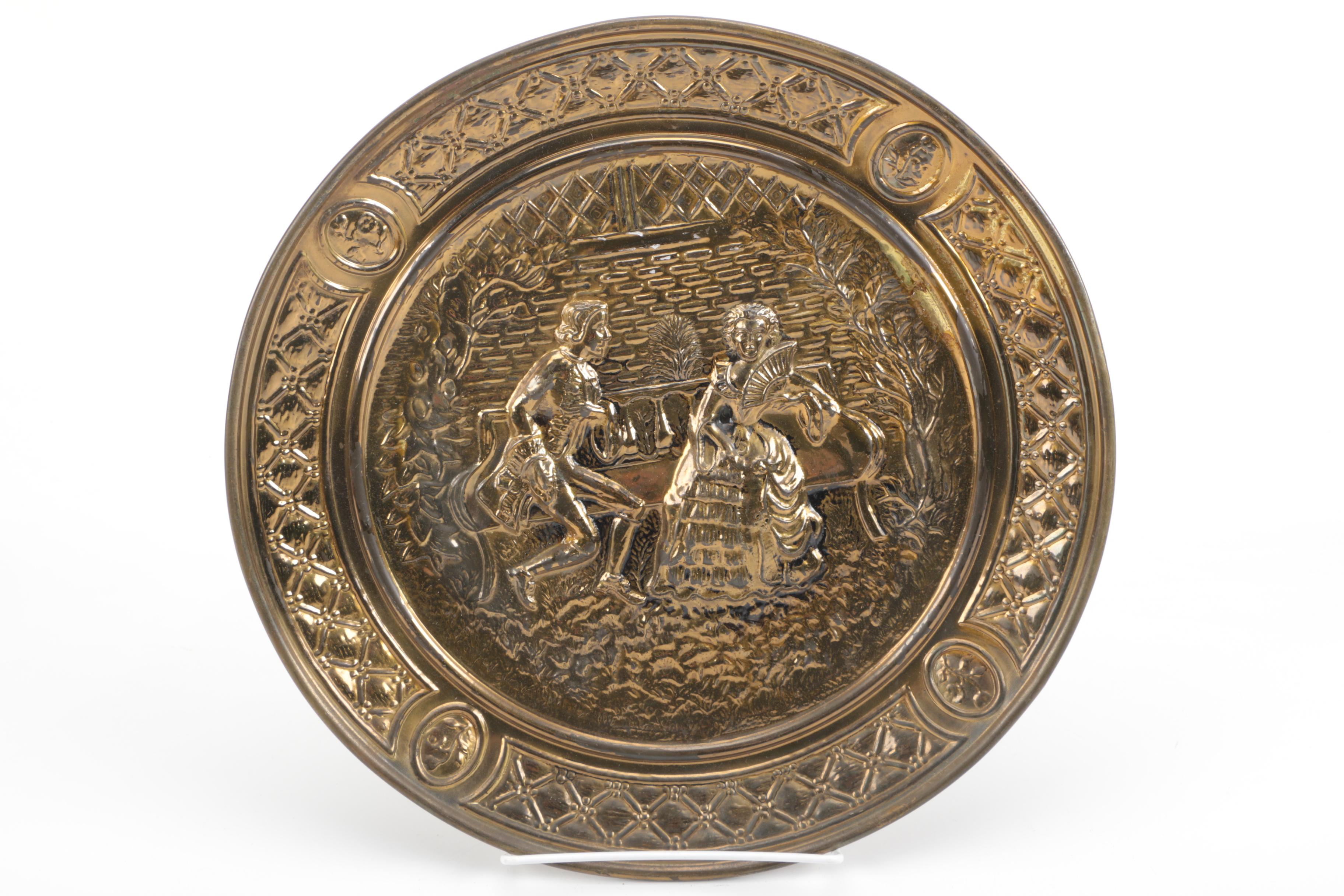 Four Decorative Brass Platters