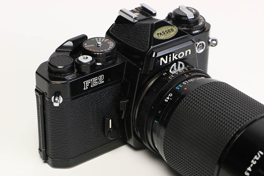 Nikon FE2 Camera with Accessories