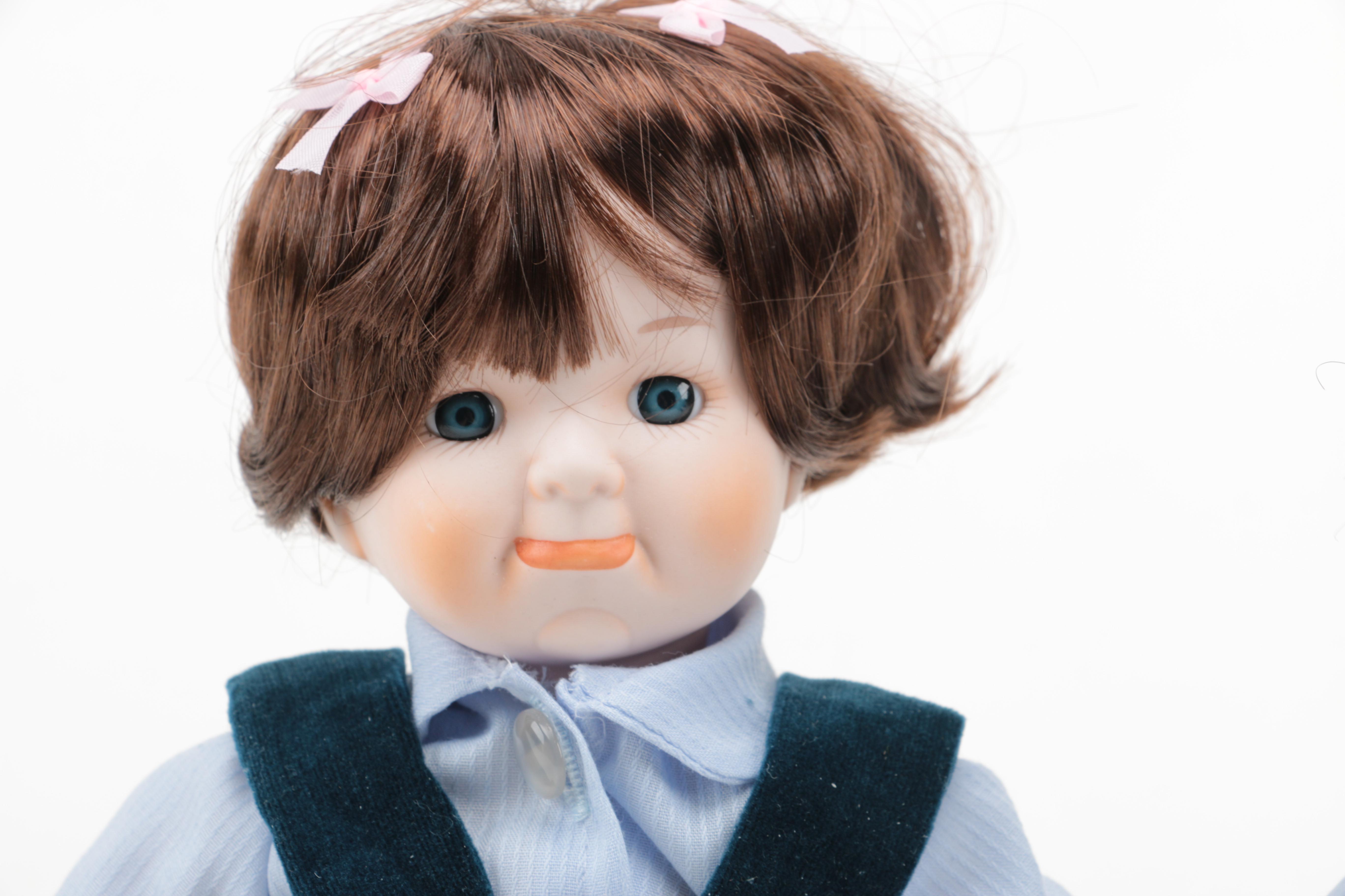 Pair of Boy and Girl Ceramic Dolls