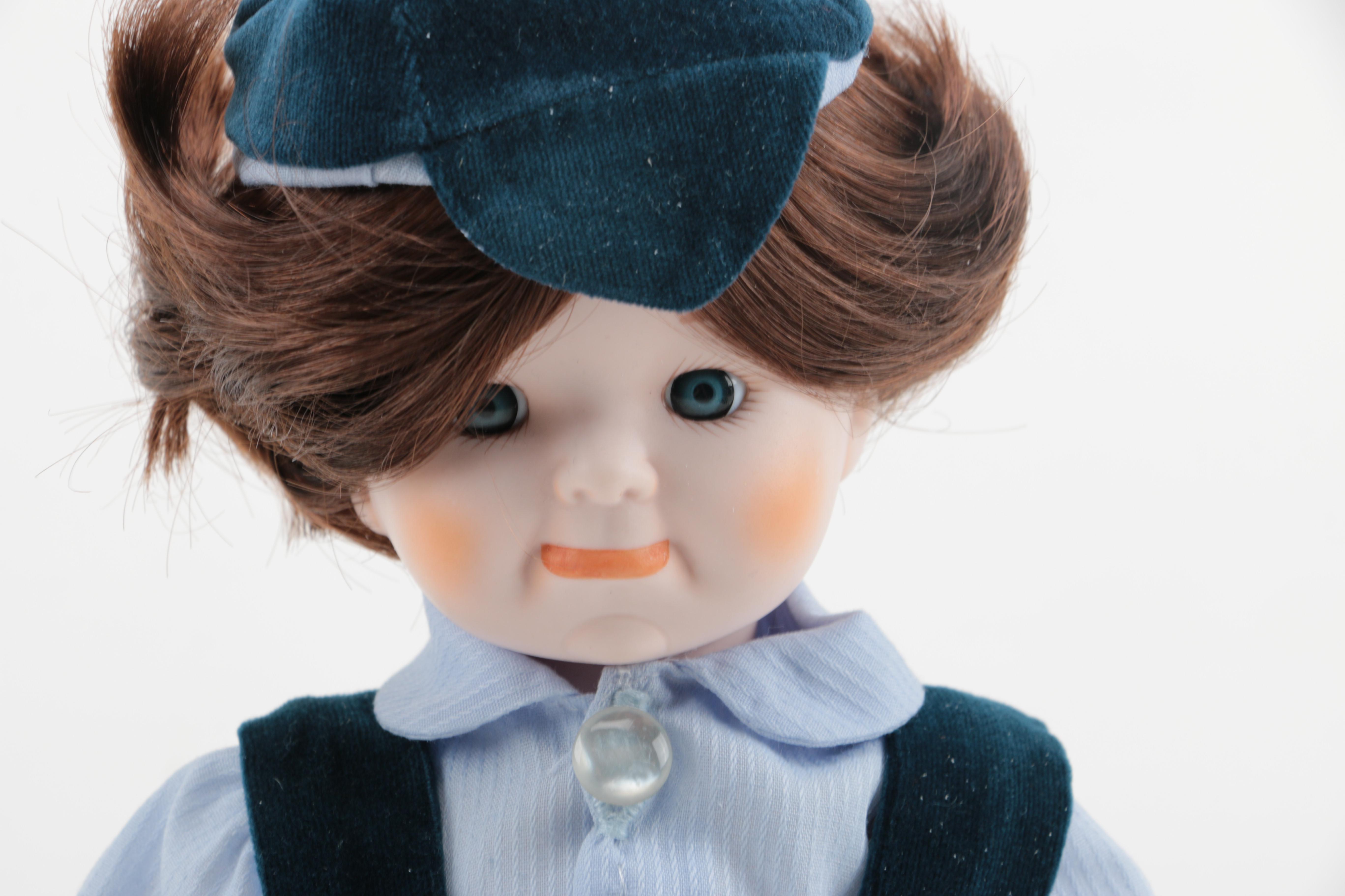 Pair of Boy and Girl Ceramic Dolls