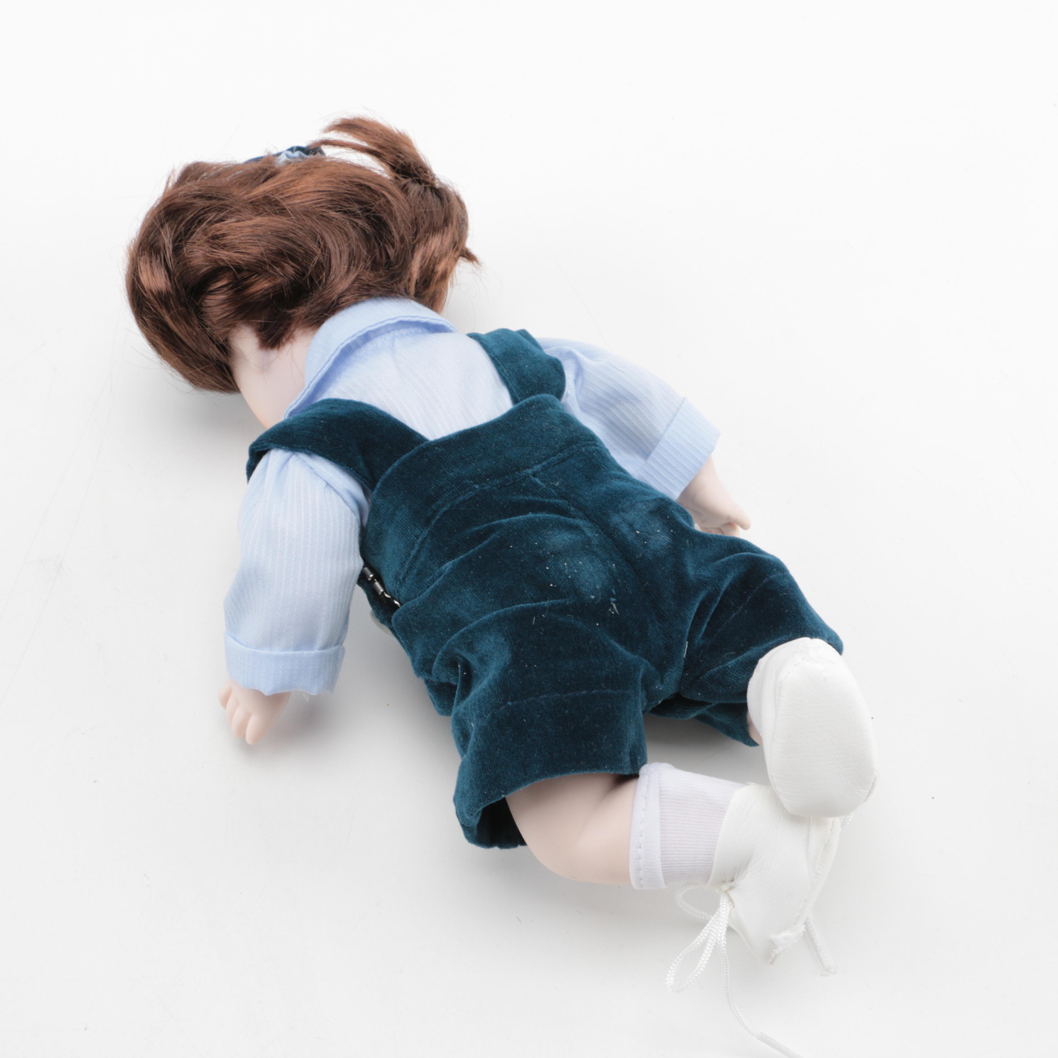 Pair of Boy and Girl Ceramic Dolls