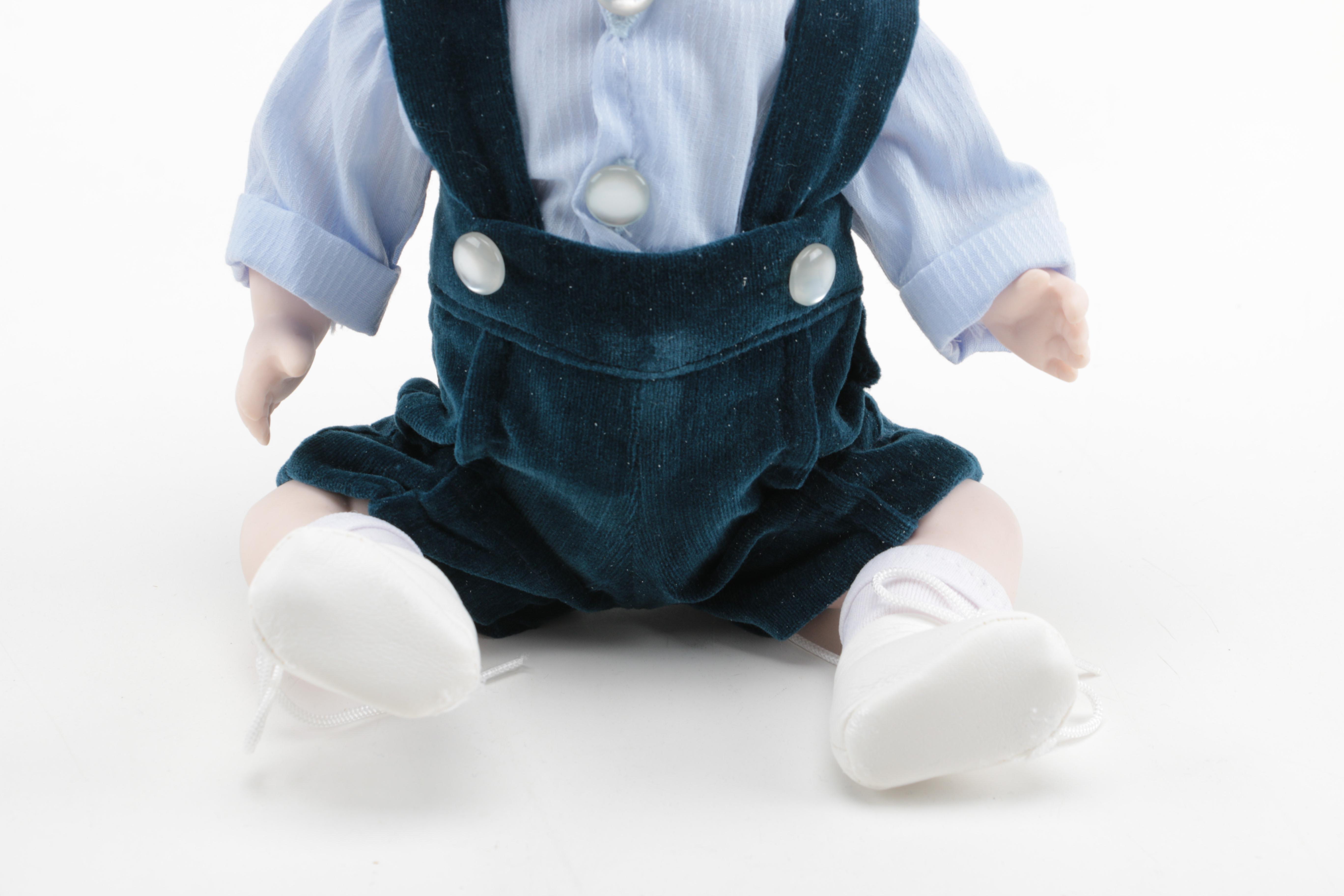 Pair of Boy and Girl Ceramic Dolls