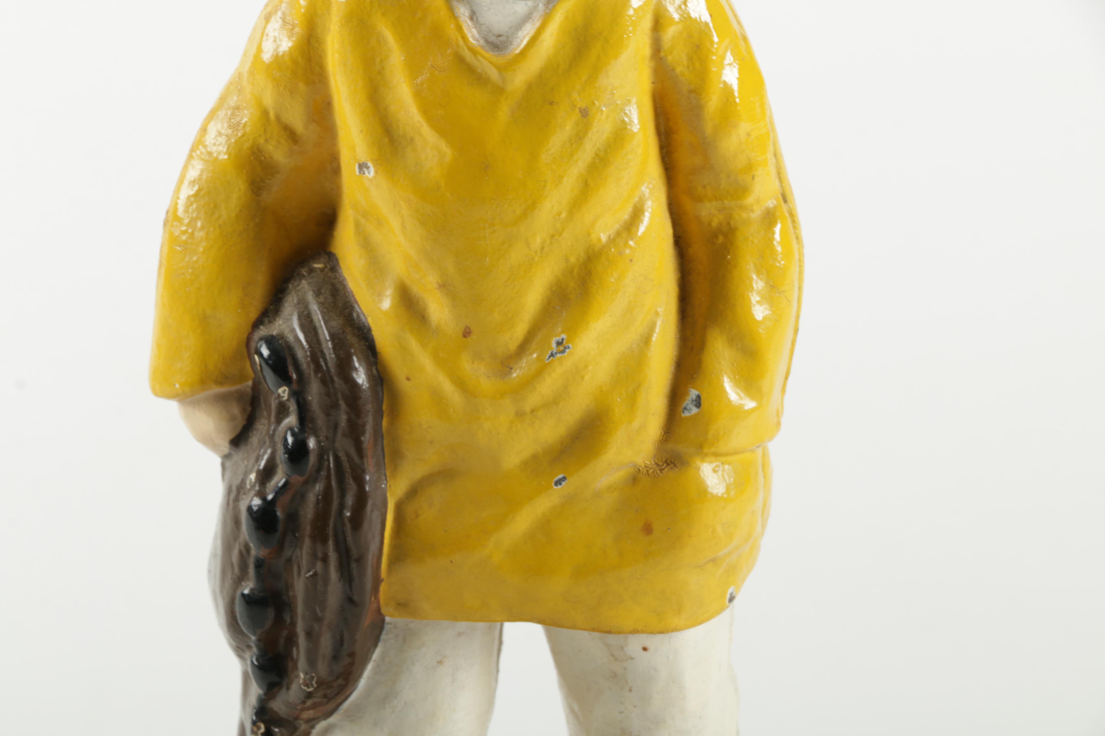 Ceramic Fisherman Statuette