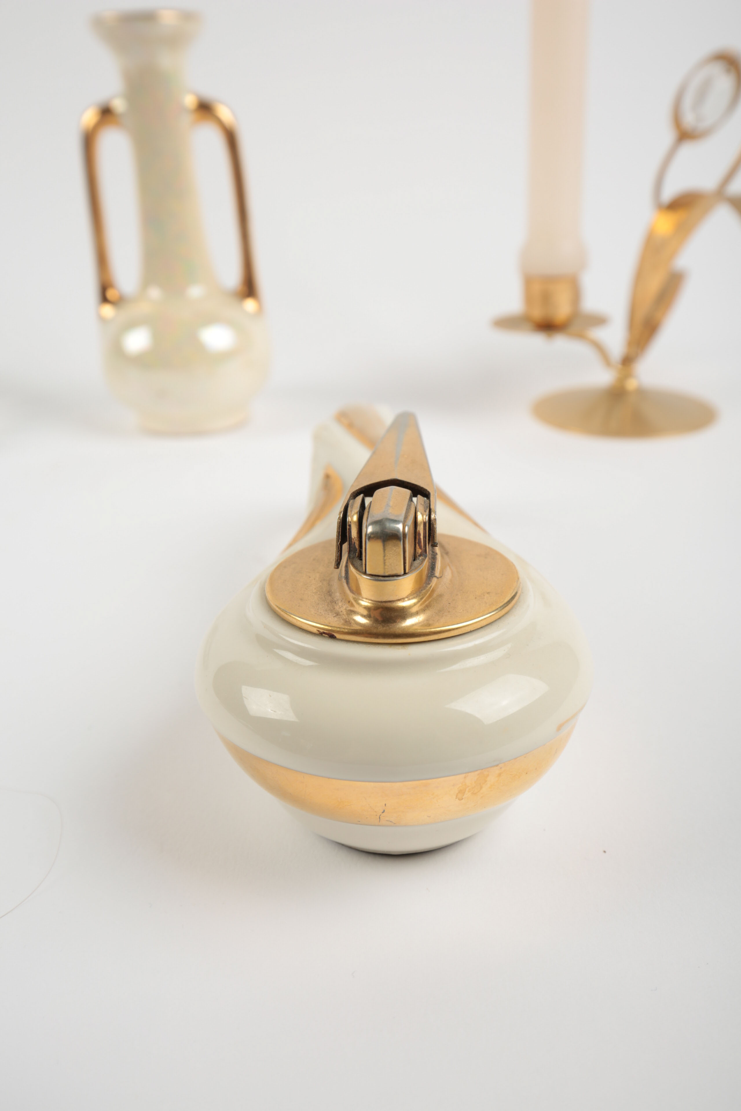 Brass and Porcelain Home Decor Including a Ronson Lighter