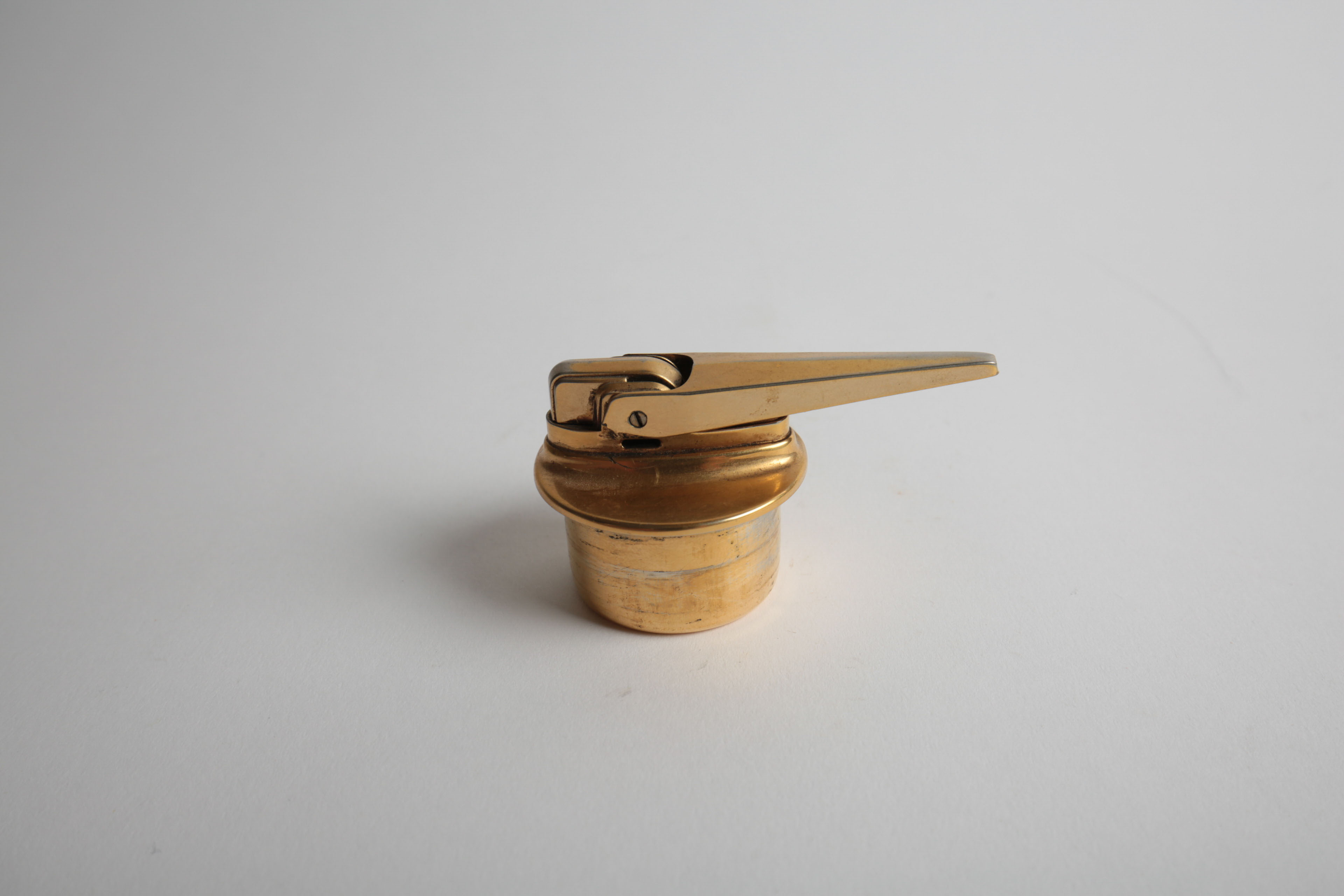 Brass and Porcelain Home Decor Including a Ronson Lighter