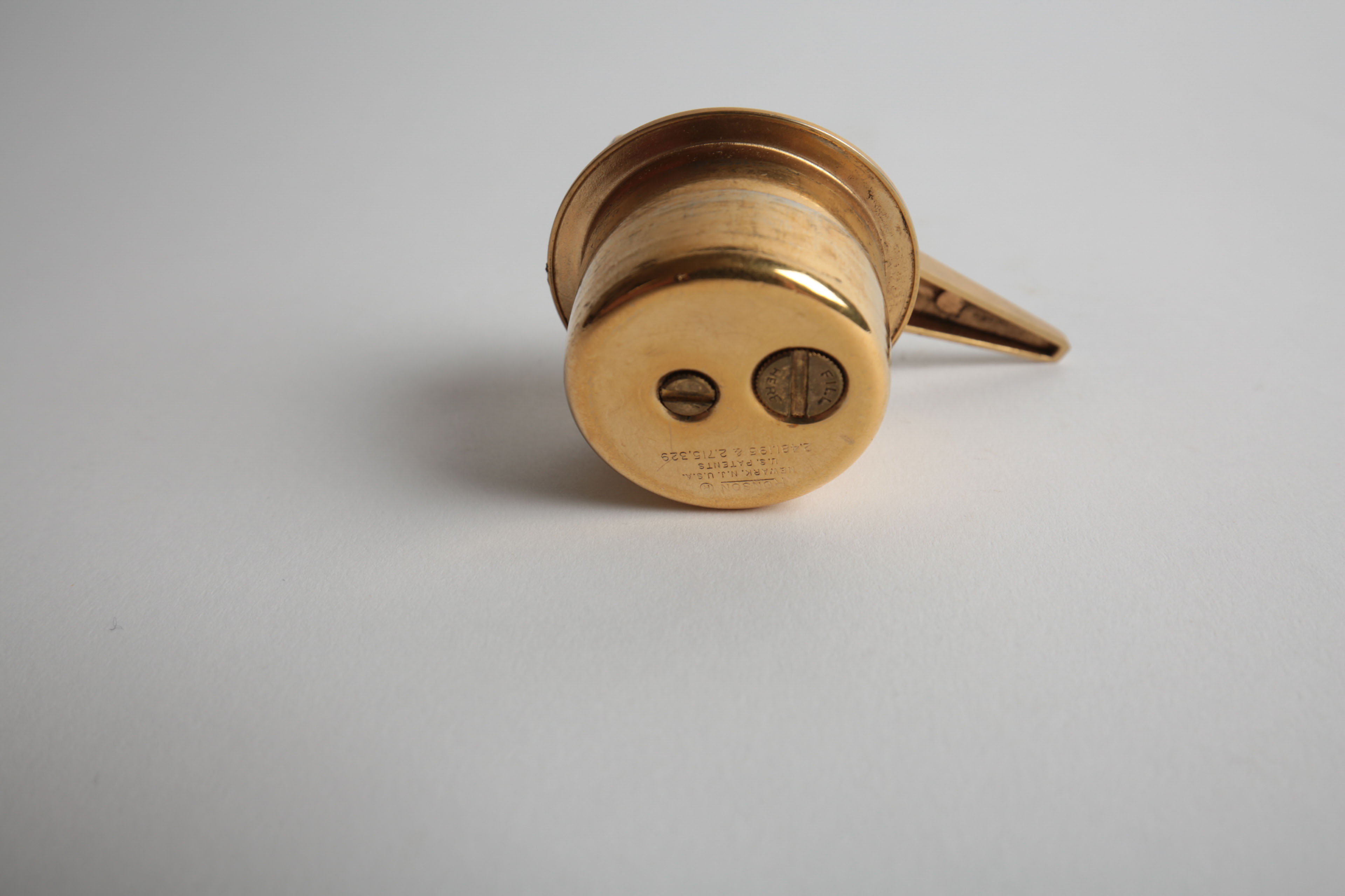 Brass and Porcelain Home Decor Including a Ronson Lighter