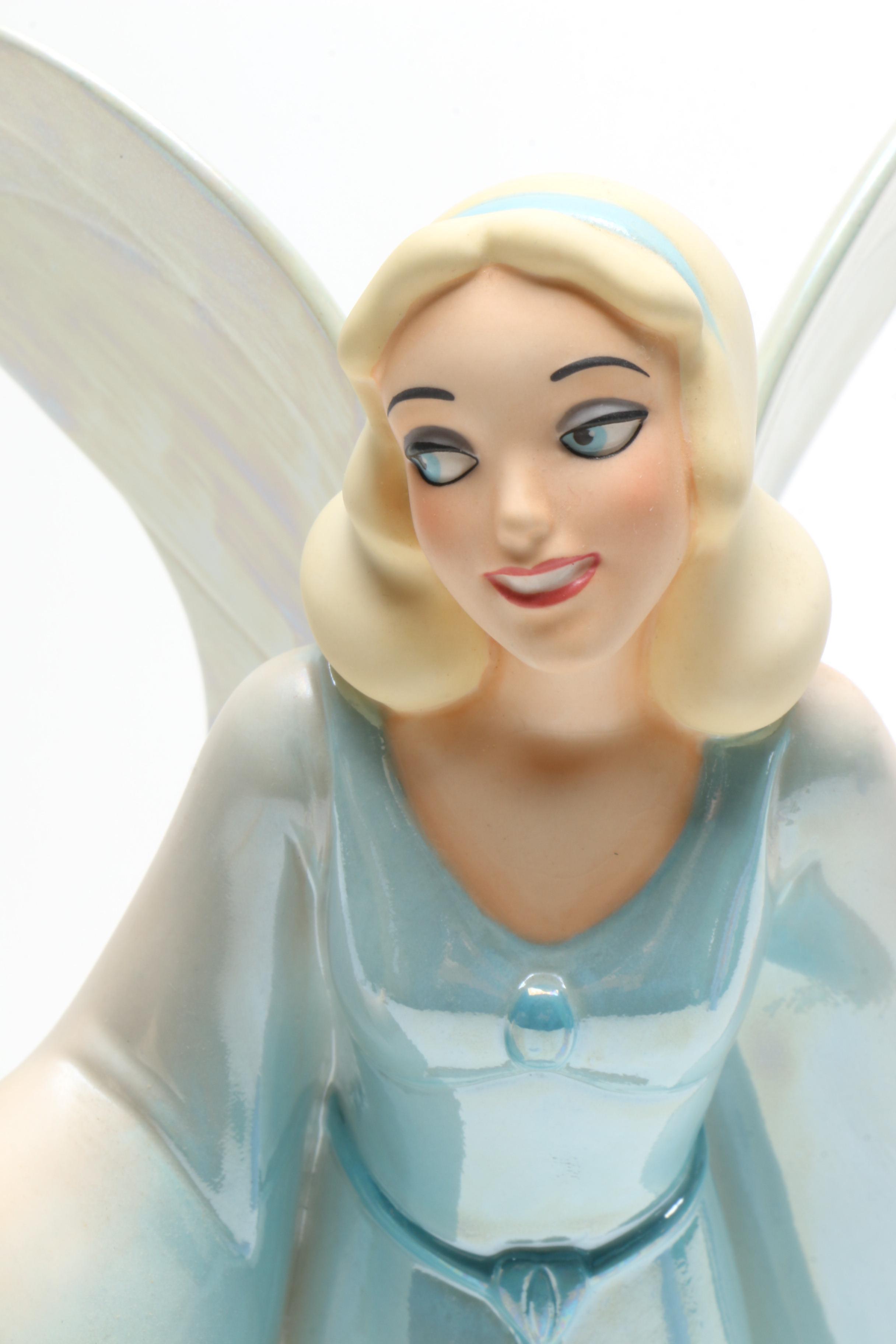 Classic Disney Figurines Including "The Fairy Godmother" from Cinderella