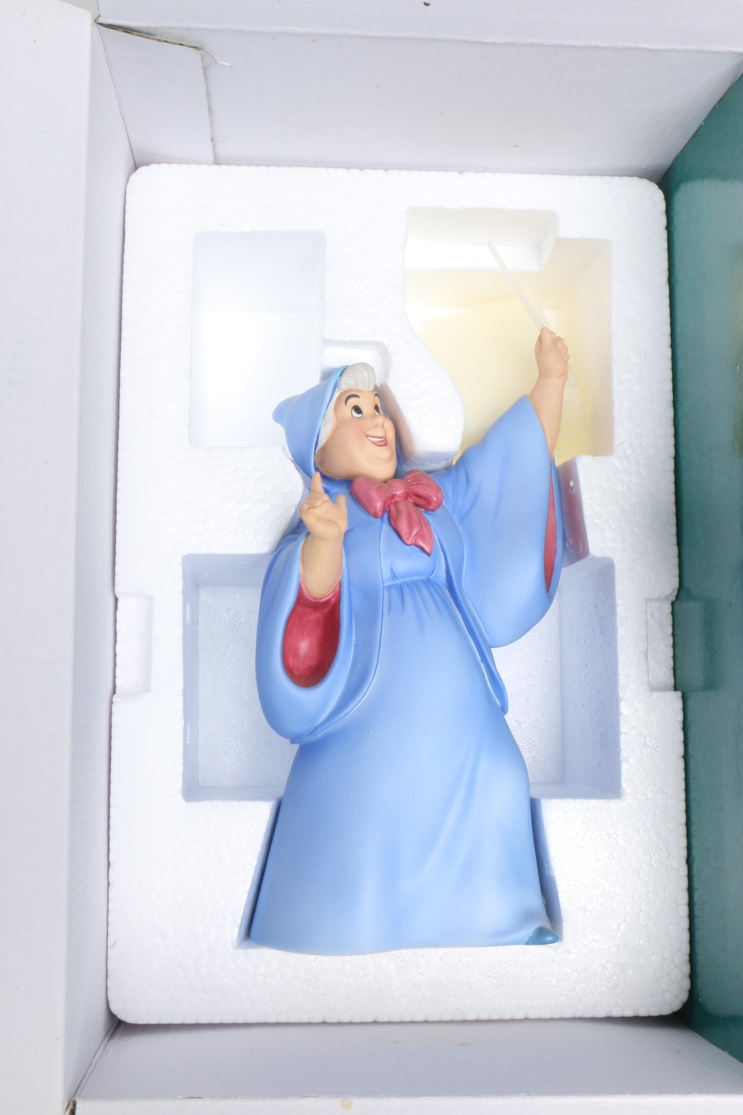 Classic Disney Figurines Including "The Fairy Godmother" from Cinderella