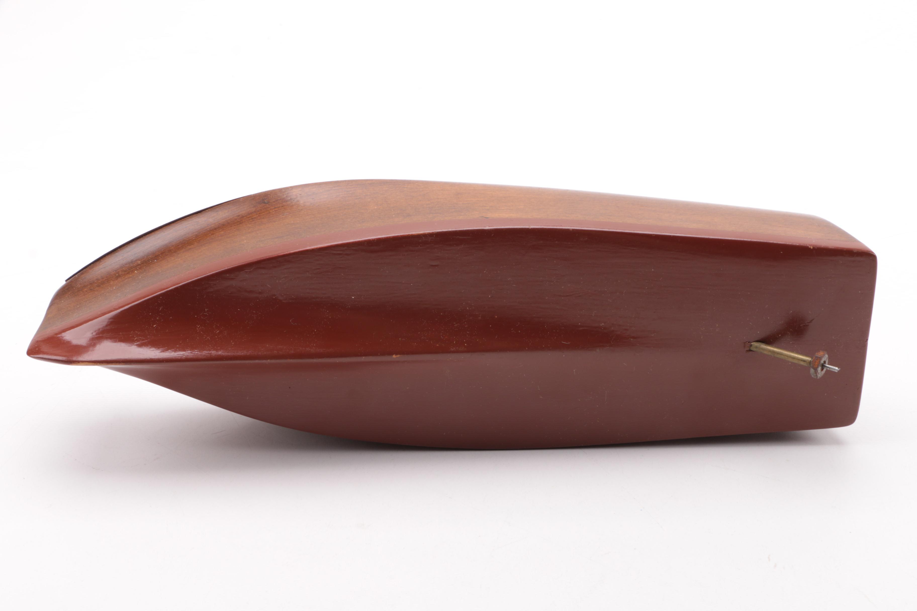 Windup Toy Boat and Vintage Miniature Evinrude Big Twin Outboard Motor