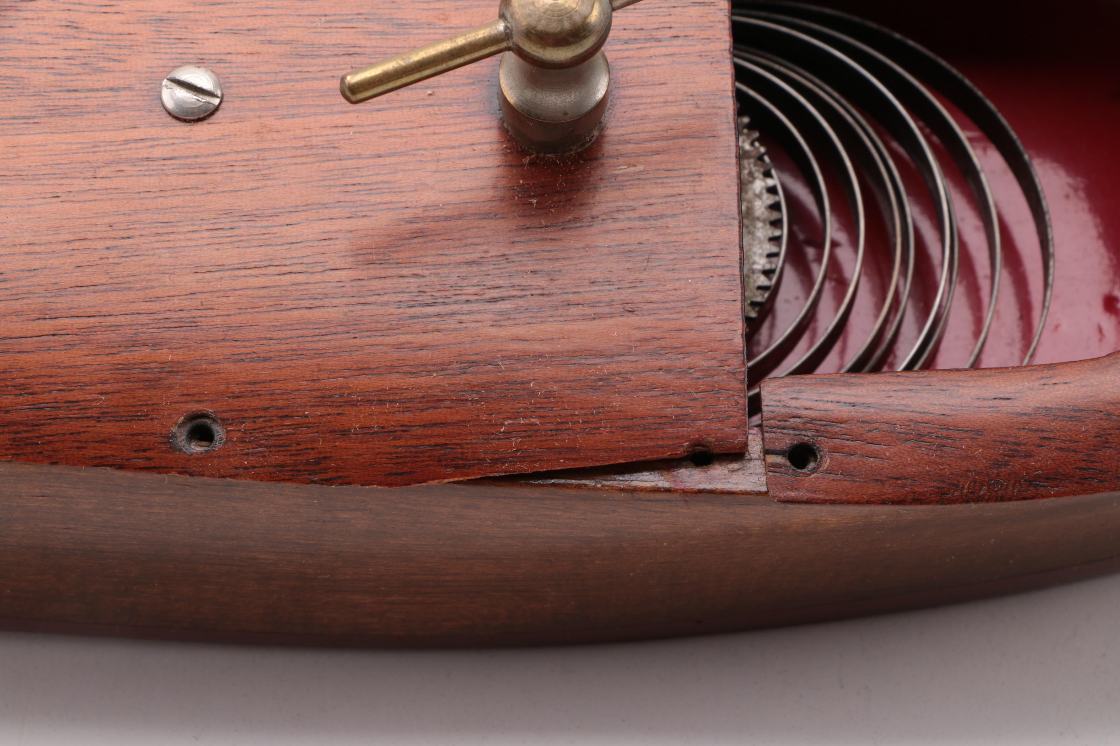 Windup Toy Boat and Vintage Miniature Evinrude Big Twin Outboard Motor