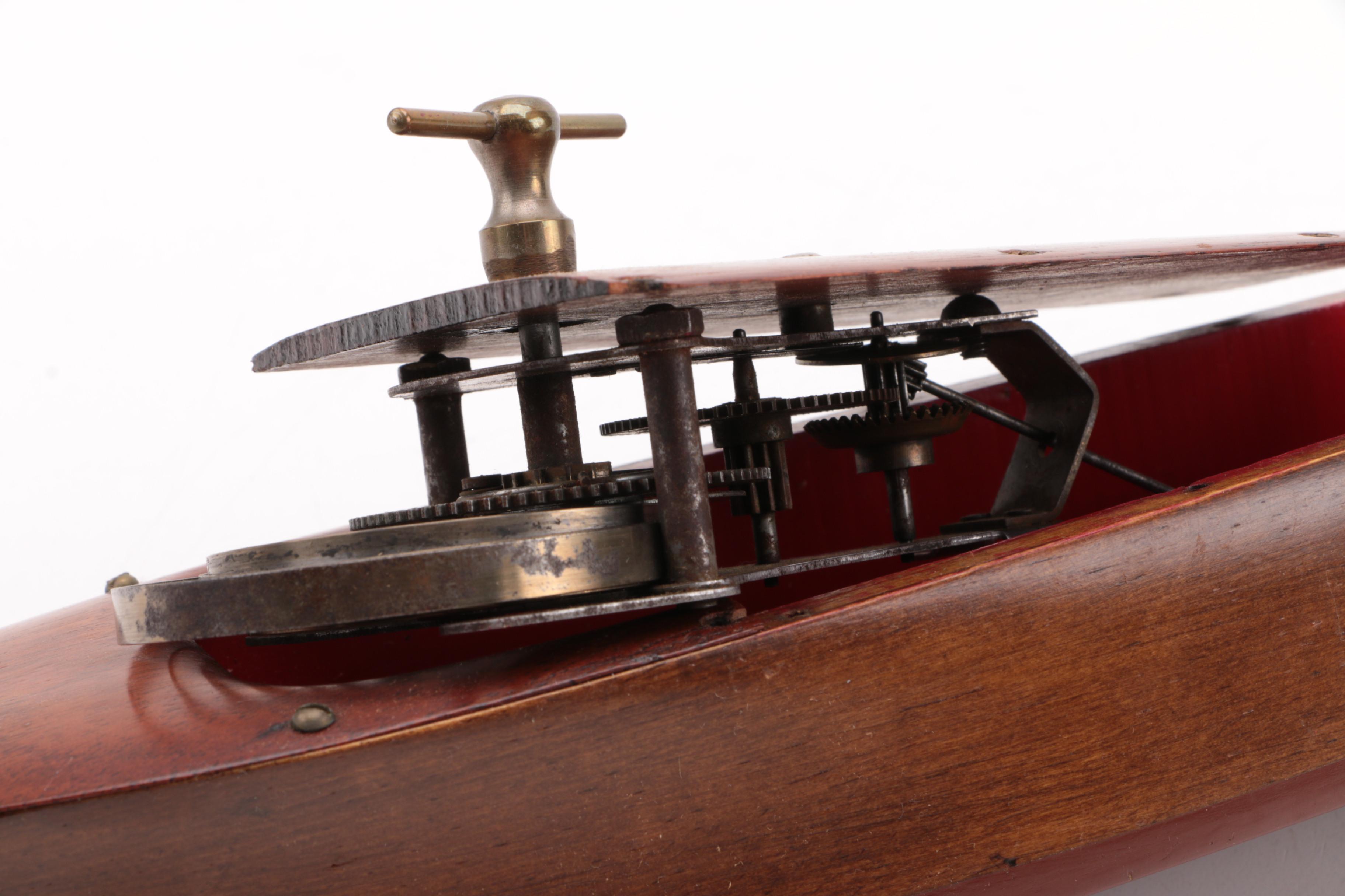 Windup Toy Boat and Vintage Miniature Evinrude Big Twin Outboard Motor