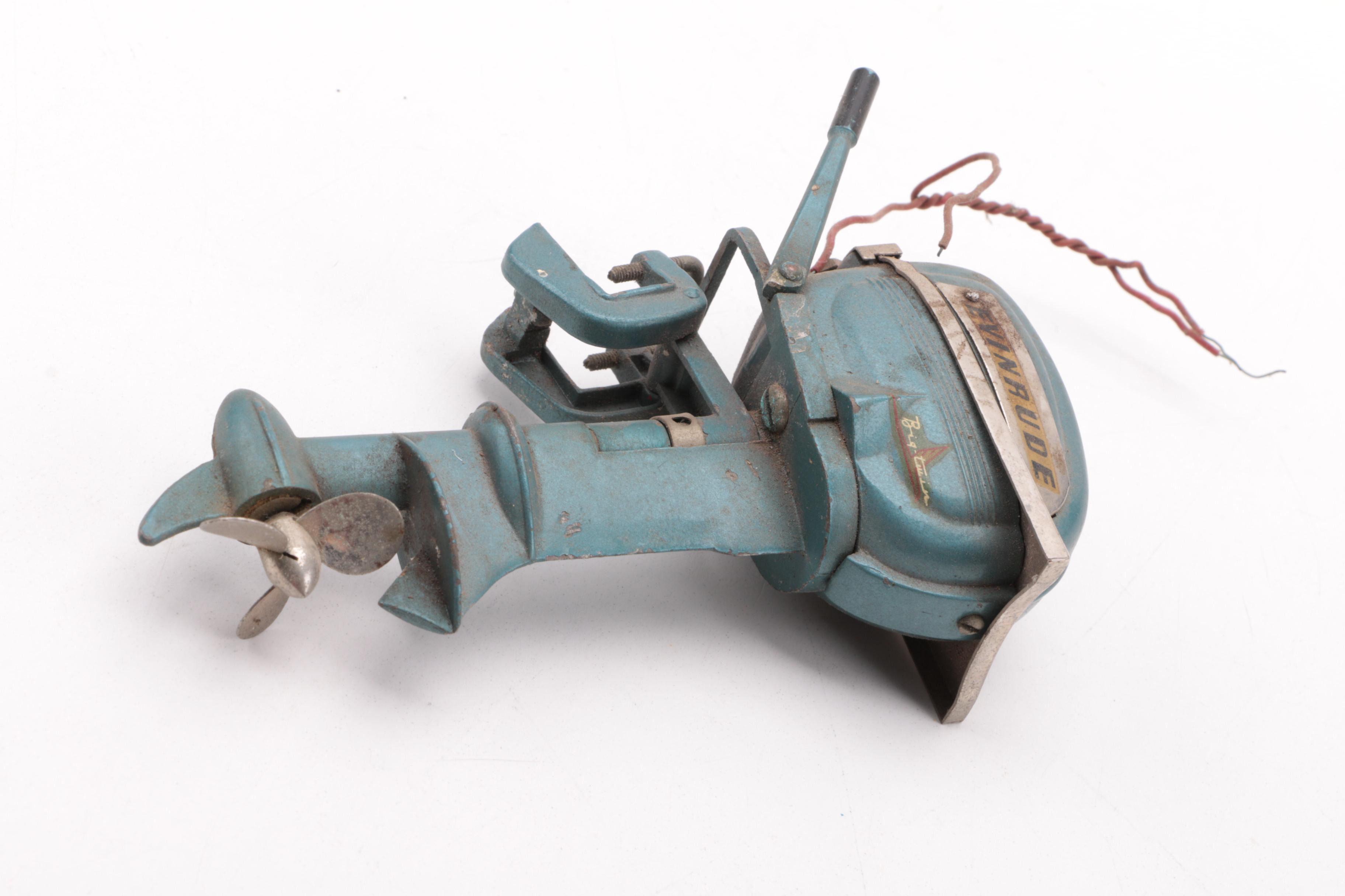 Windup Toy Boat and Vintage Miniature Evinrude Big Twin Outboard Motor
